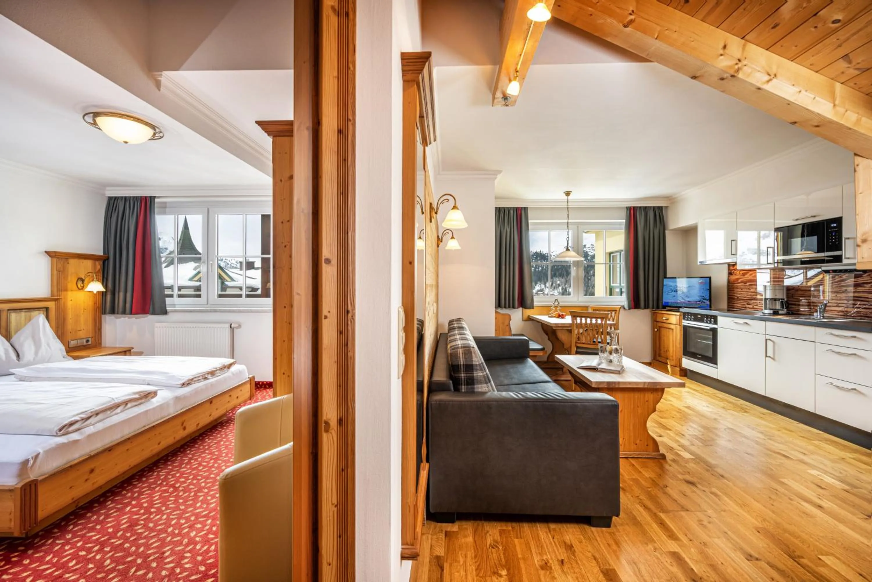 Living room, Bed in Hotel Almschlössl & Schrotteralm