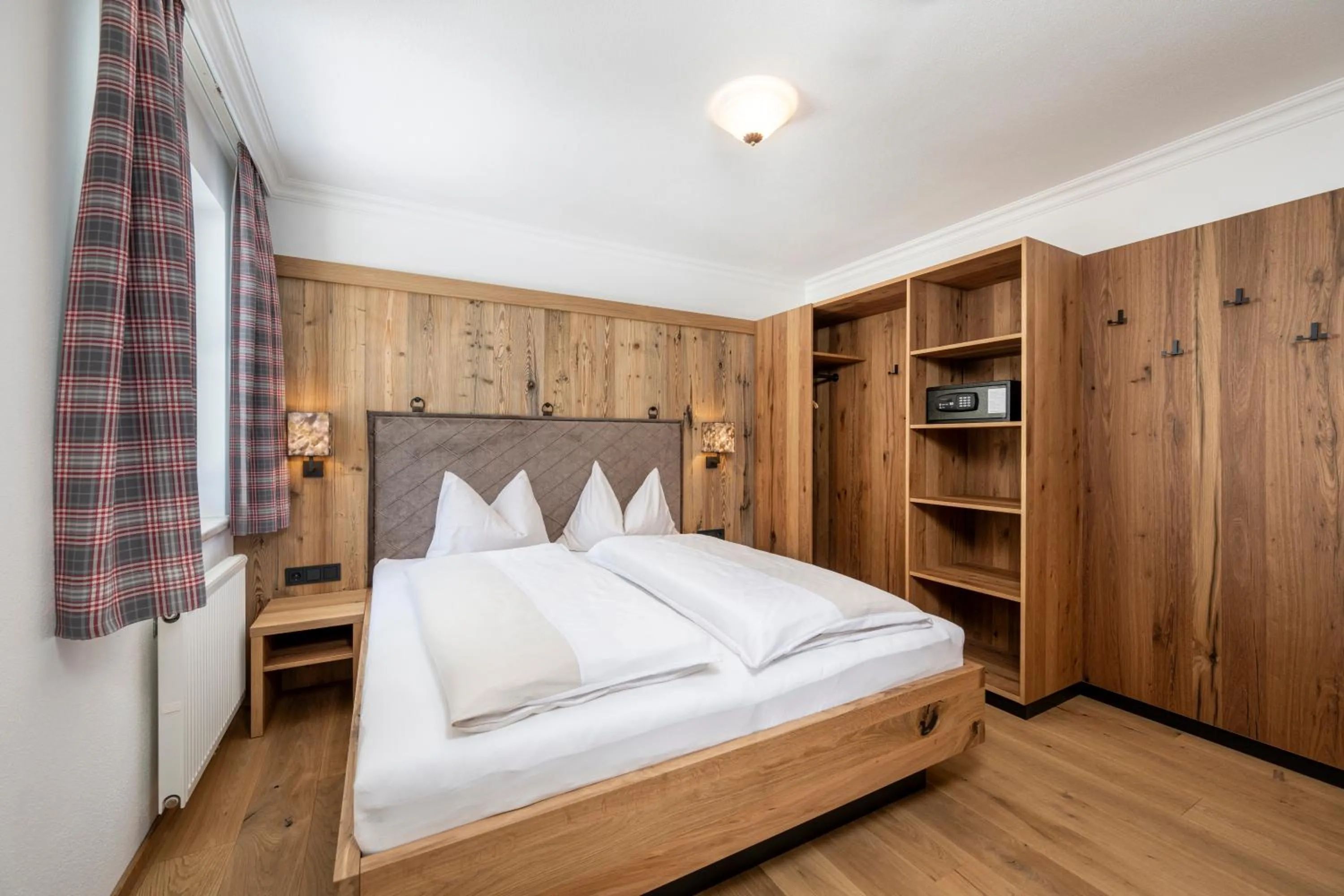 Bed in Hotel Almschlössl & Schrotteralm