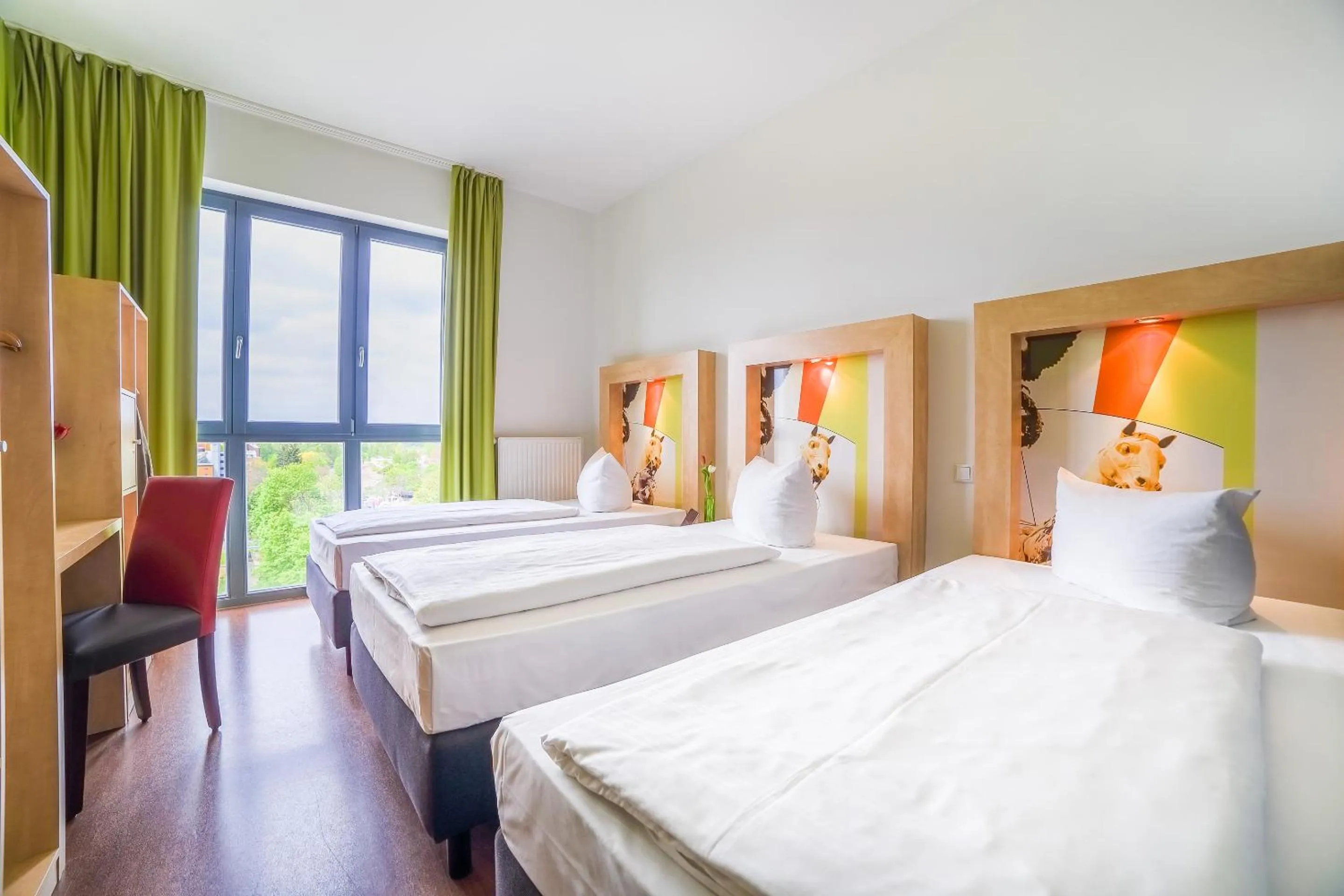 Photo of the whole room, Bed in H+ Hotel 4Youth