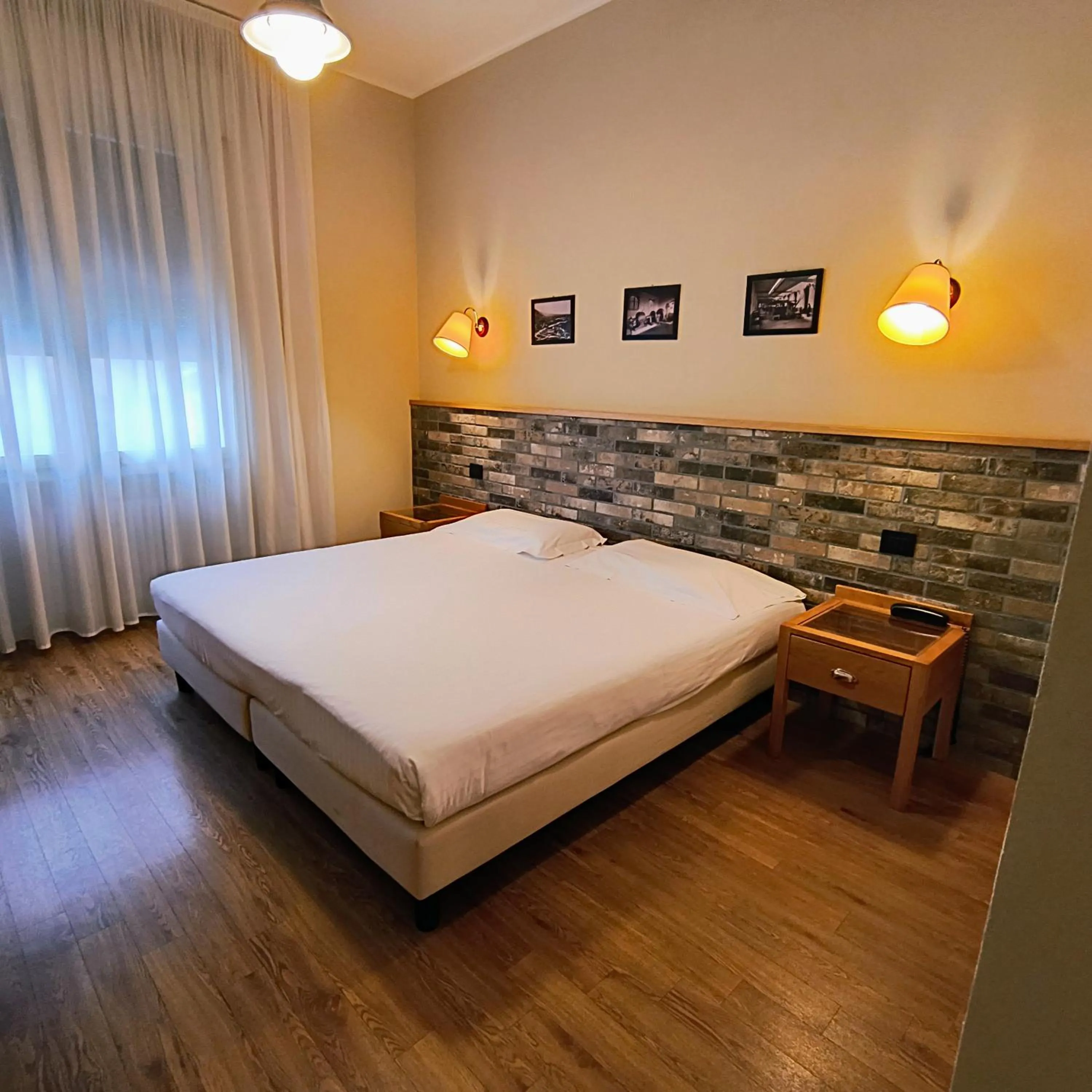 Bed in Hotel Miramonti