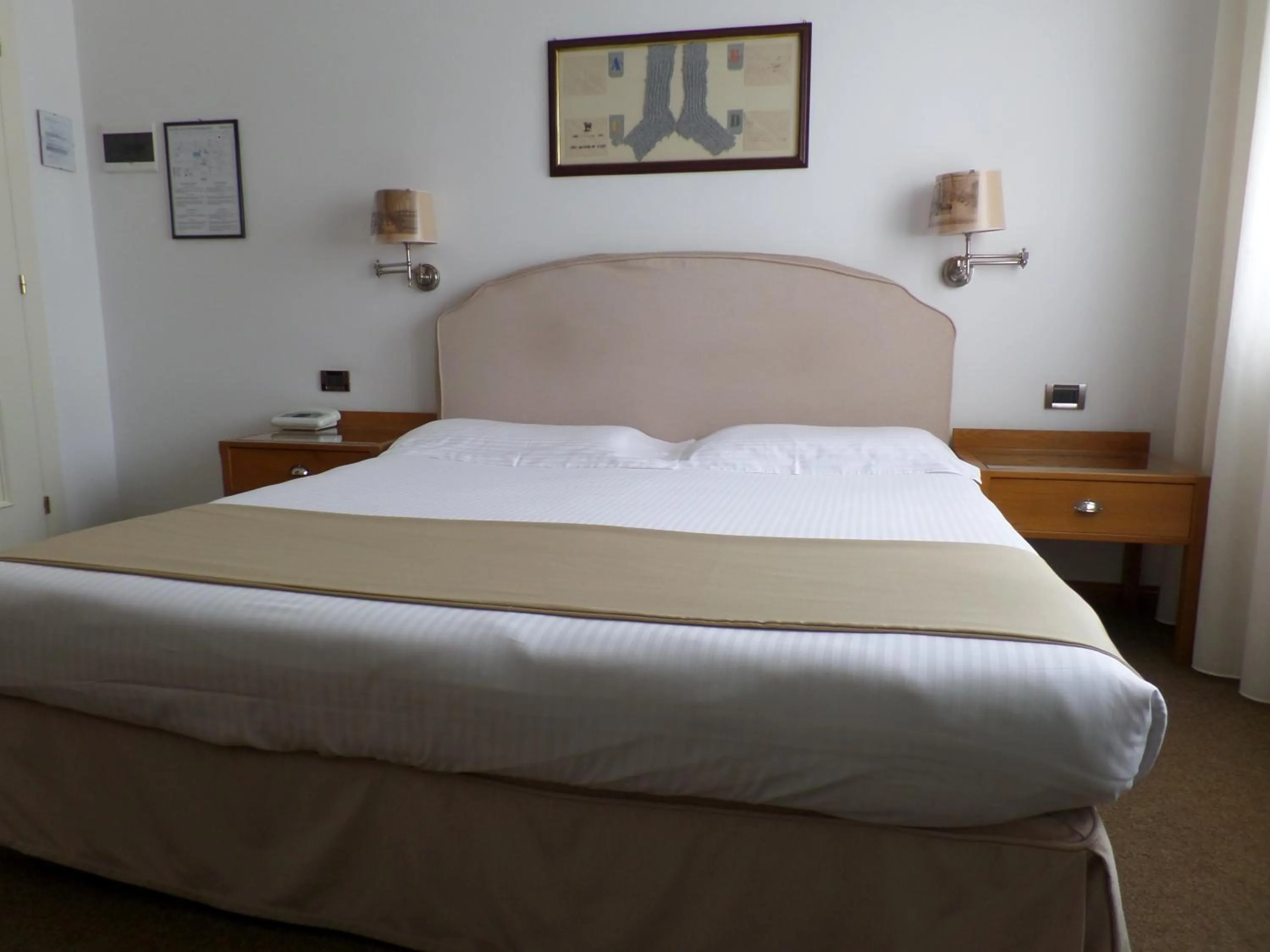 Bed in Hotel Miramonti