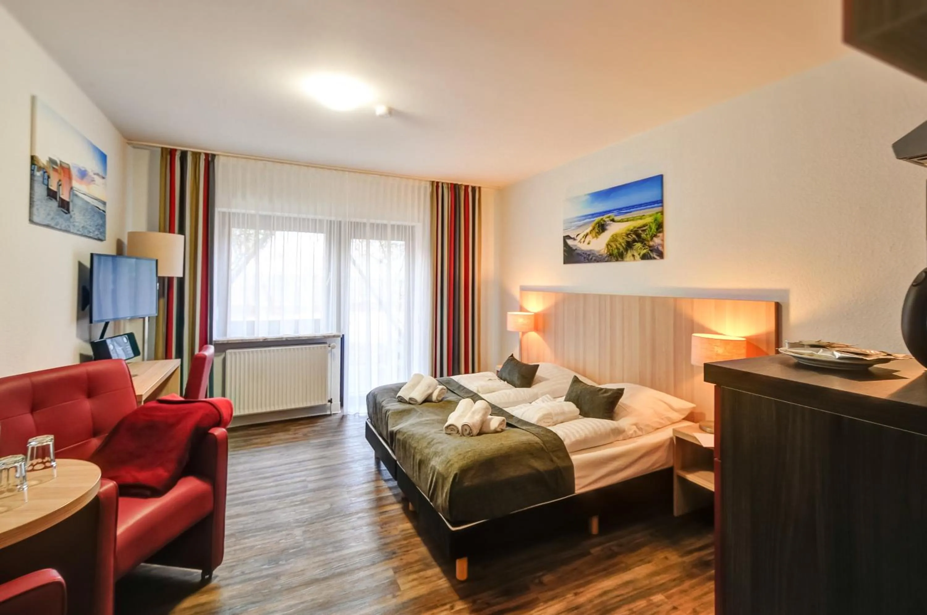 Photo of the whole room, Bed in Hotel Sonneninsel Fehmarn