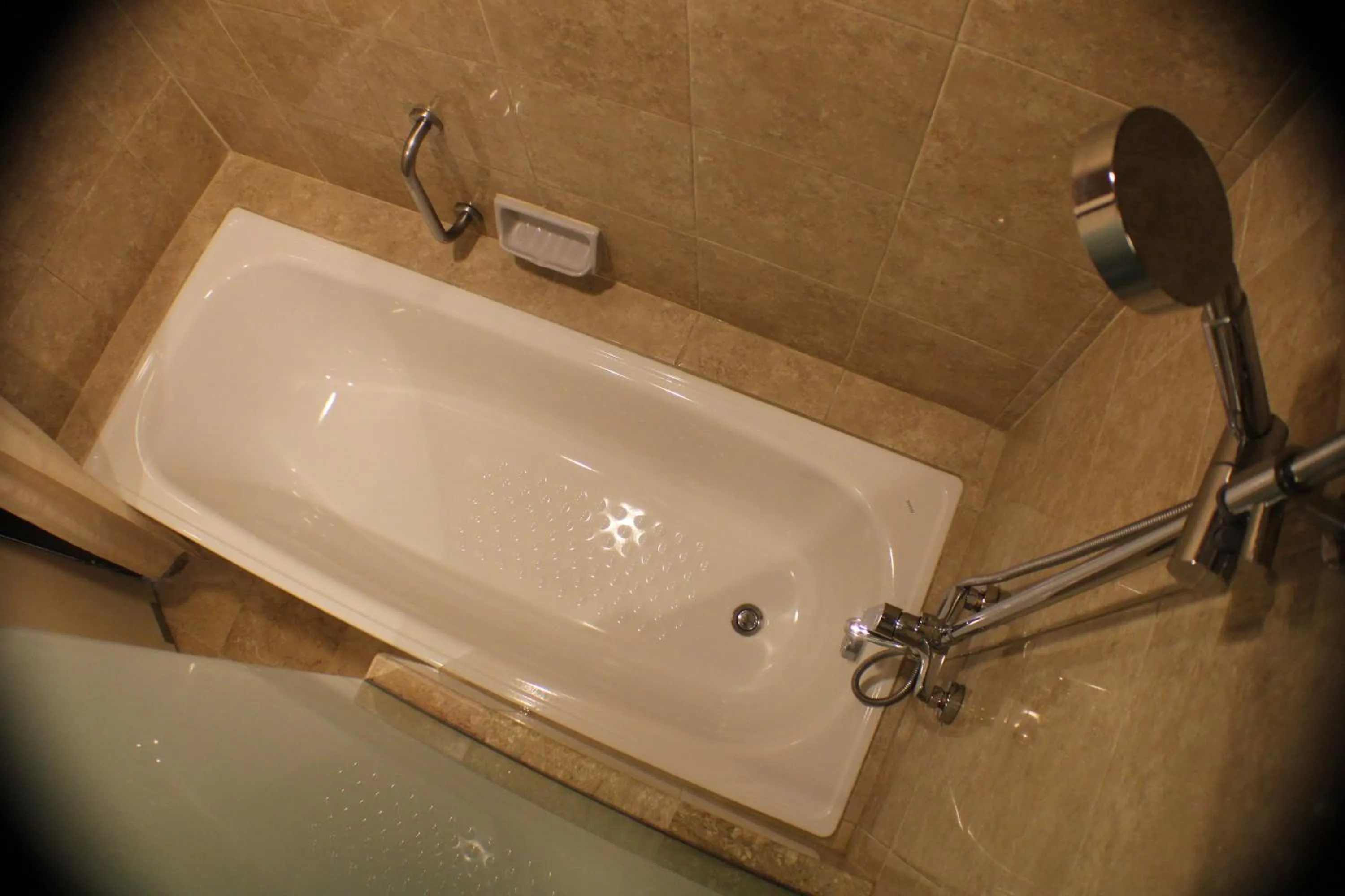 Bathroom in Travellers Hotel Jakarta