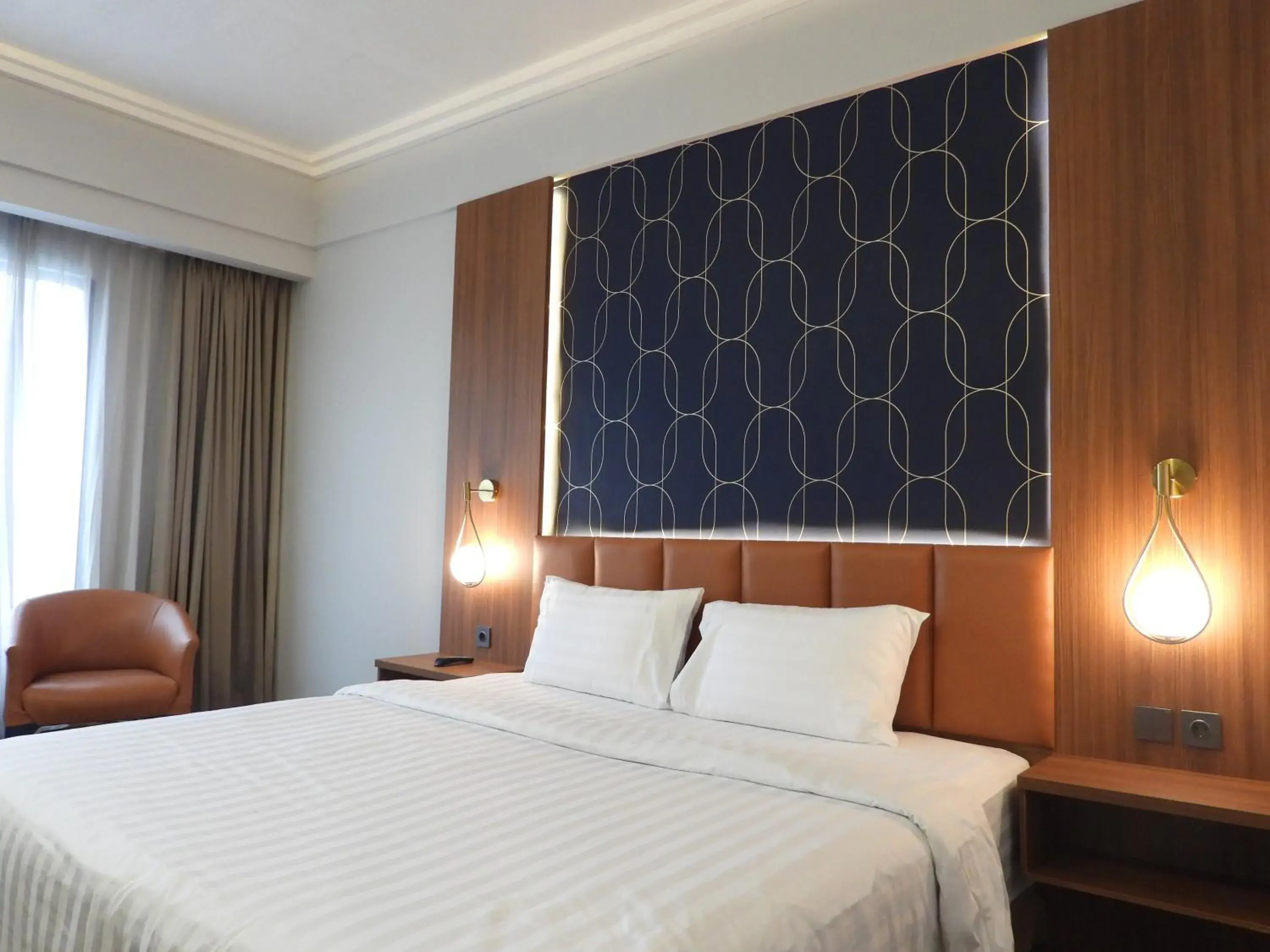 Bedroom in Travellers Hotel Jakarta