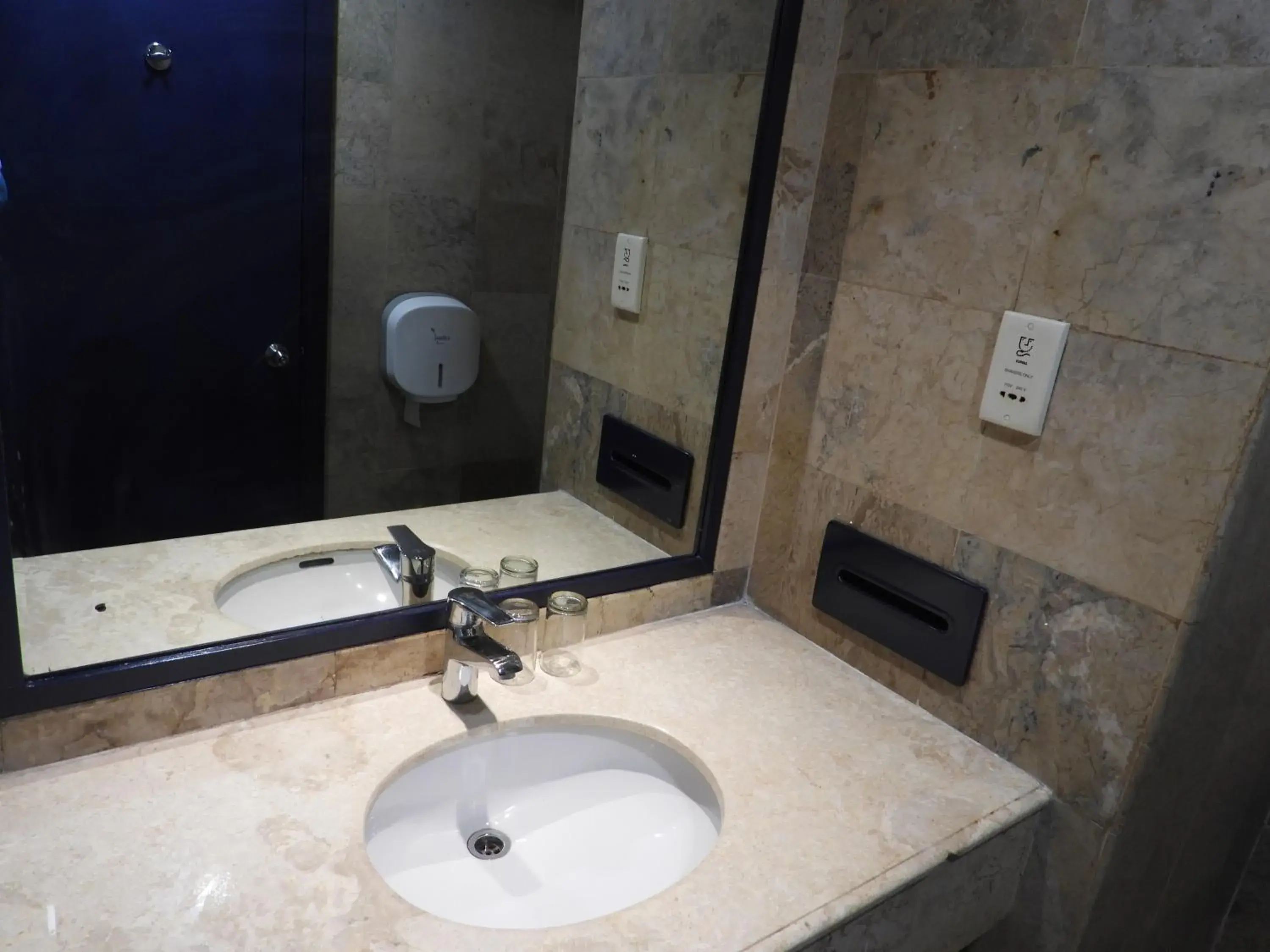Bathroom in Travellers Hotel Jakarta