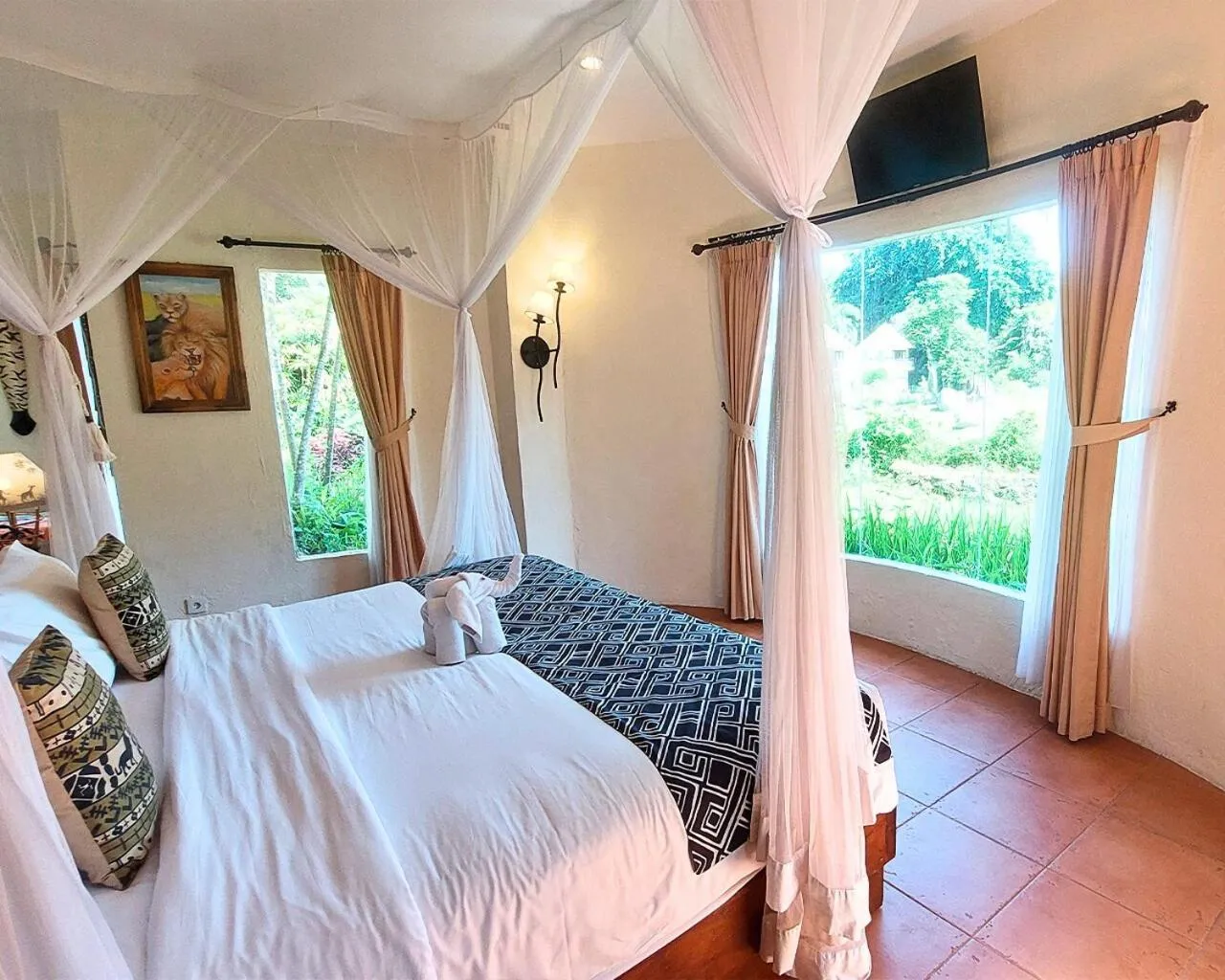 Bed in Mara River Safari Lodge Bali