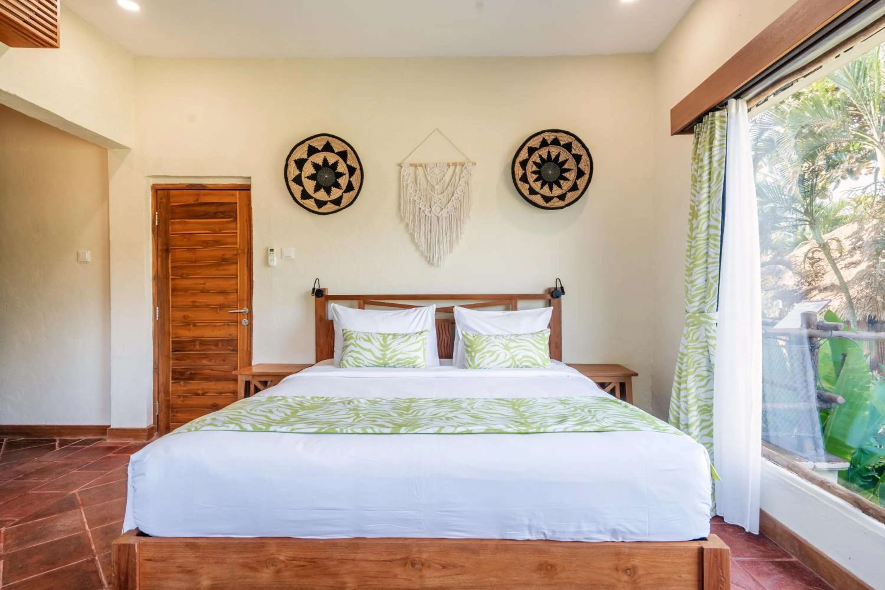 Bed in Mara River Safari Lodge Bali