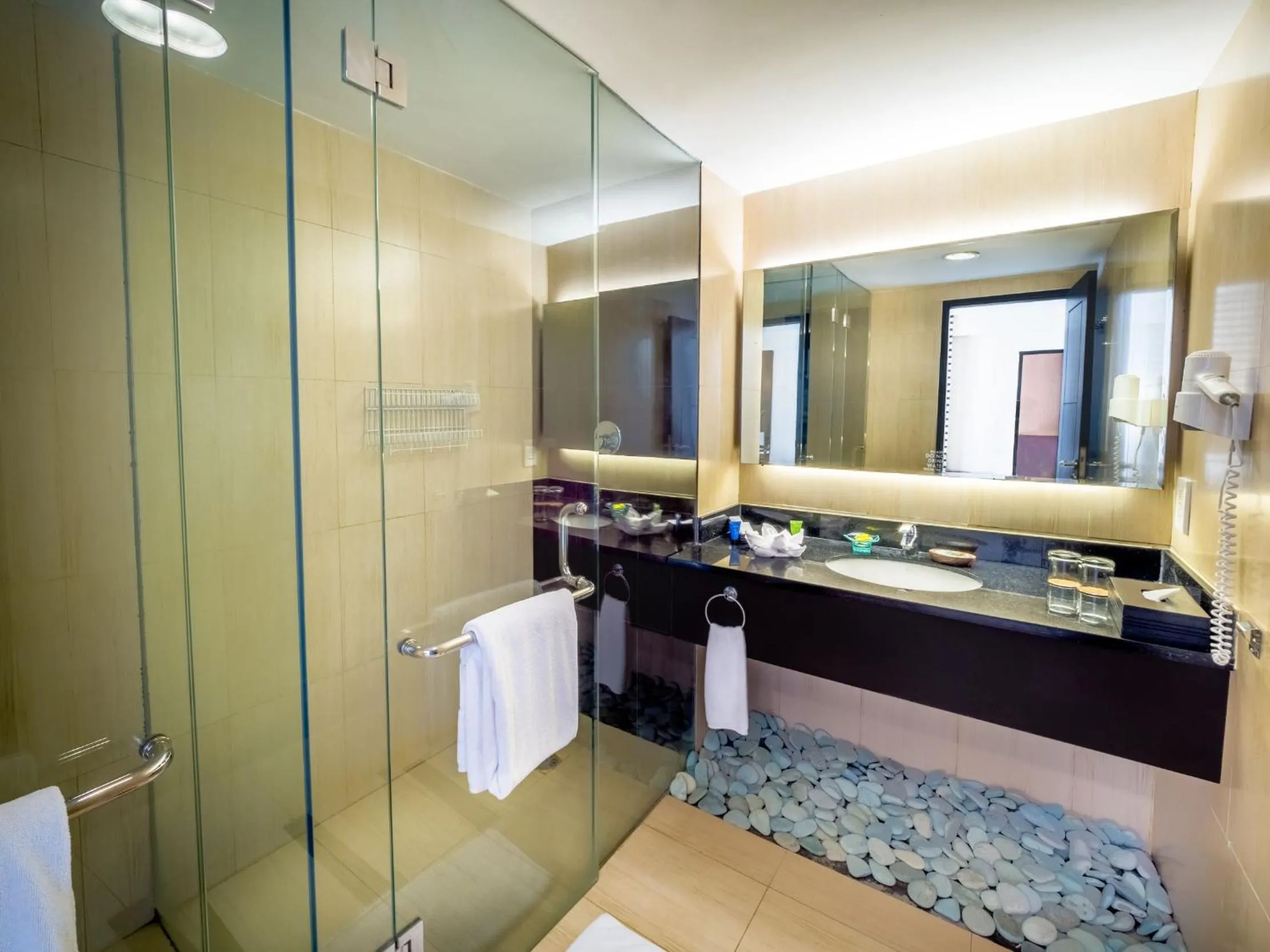 Shower in Aston Kuta Hotel and Residence