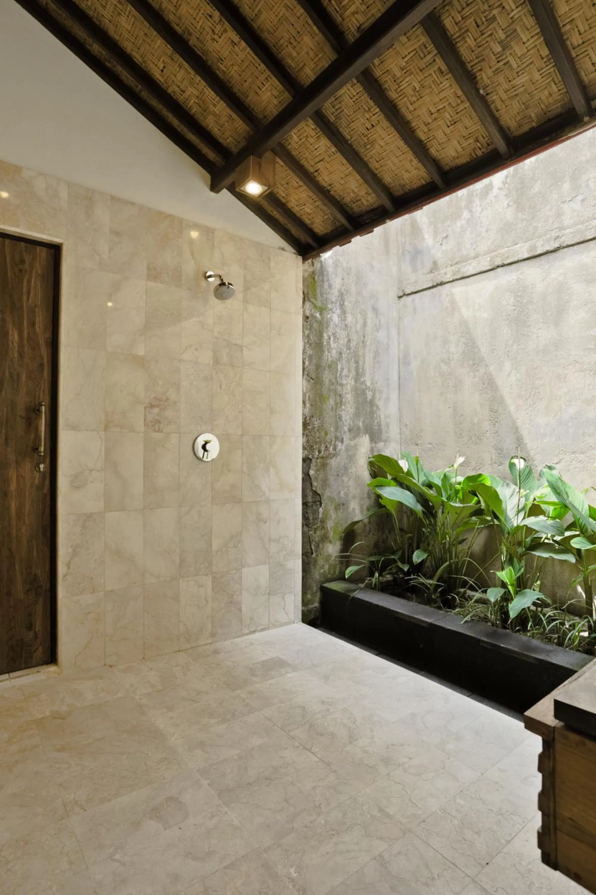 Shower in Sri Ratih Cottages, CHSE Certified