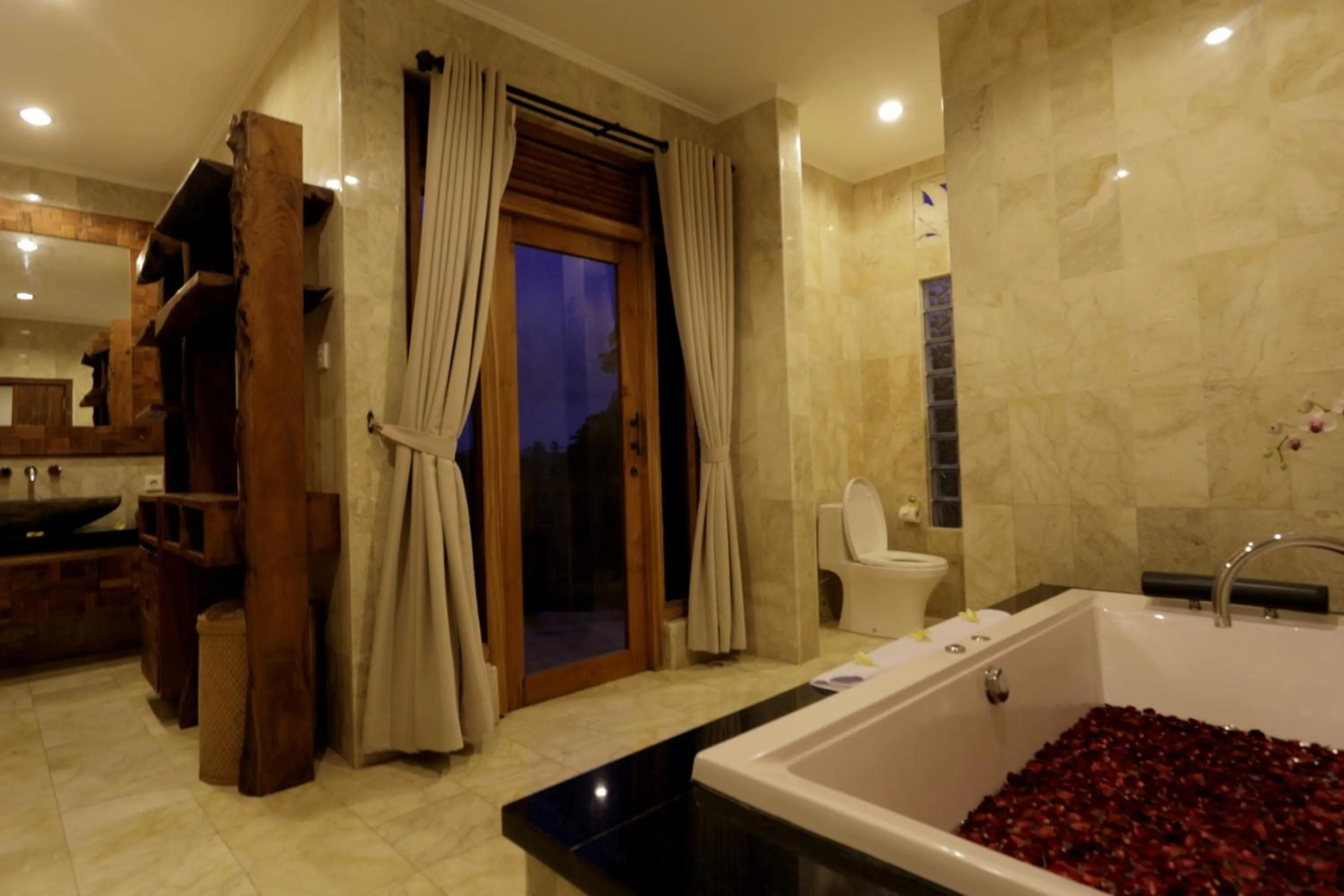 Shower in Sri Ratih Cottages, CHSE Certified