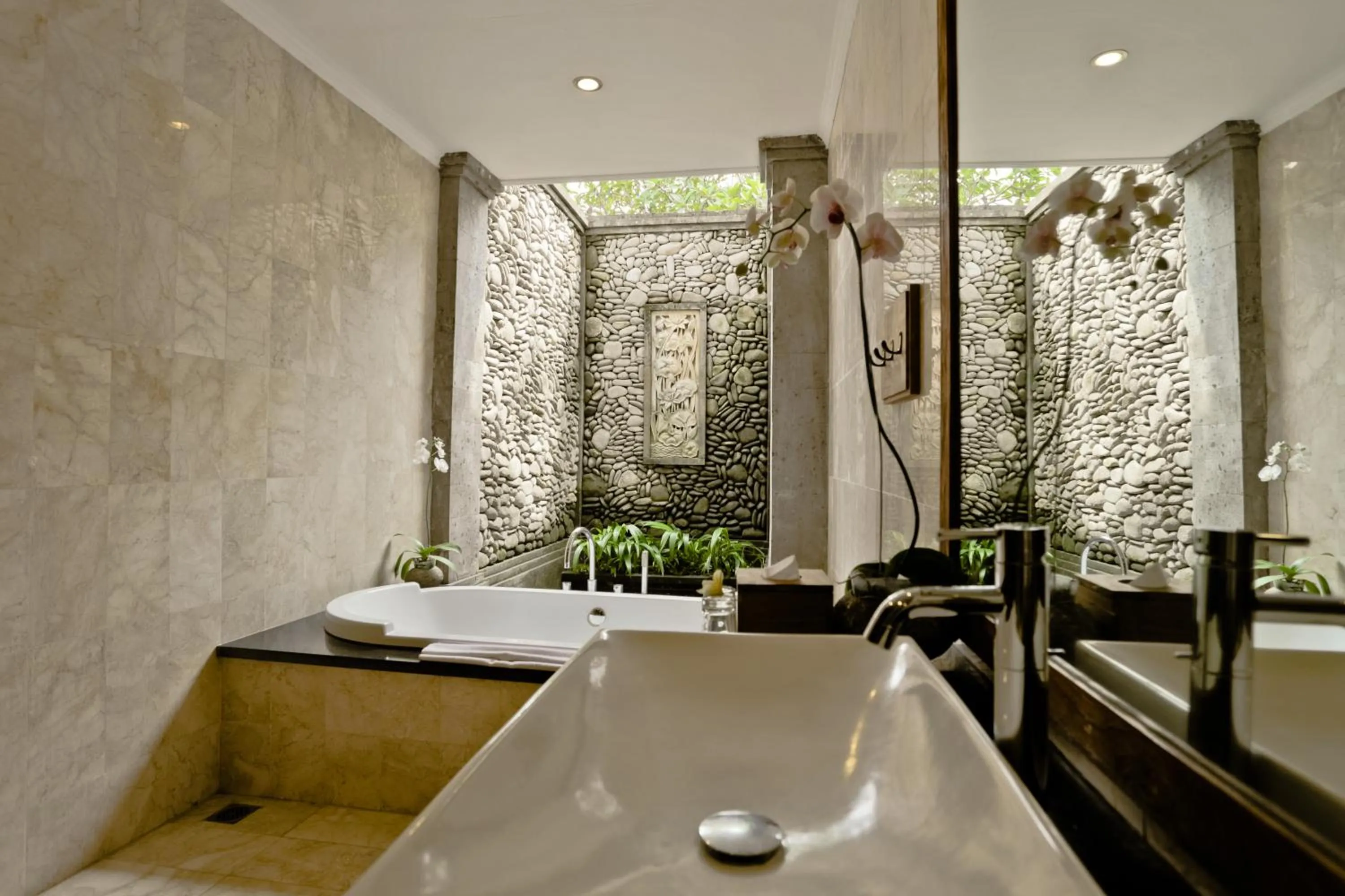 Shower in Sri Ratih Cottages, CHSE Certified