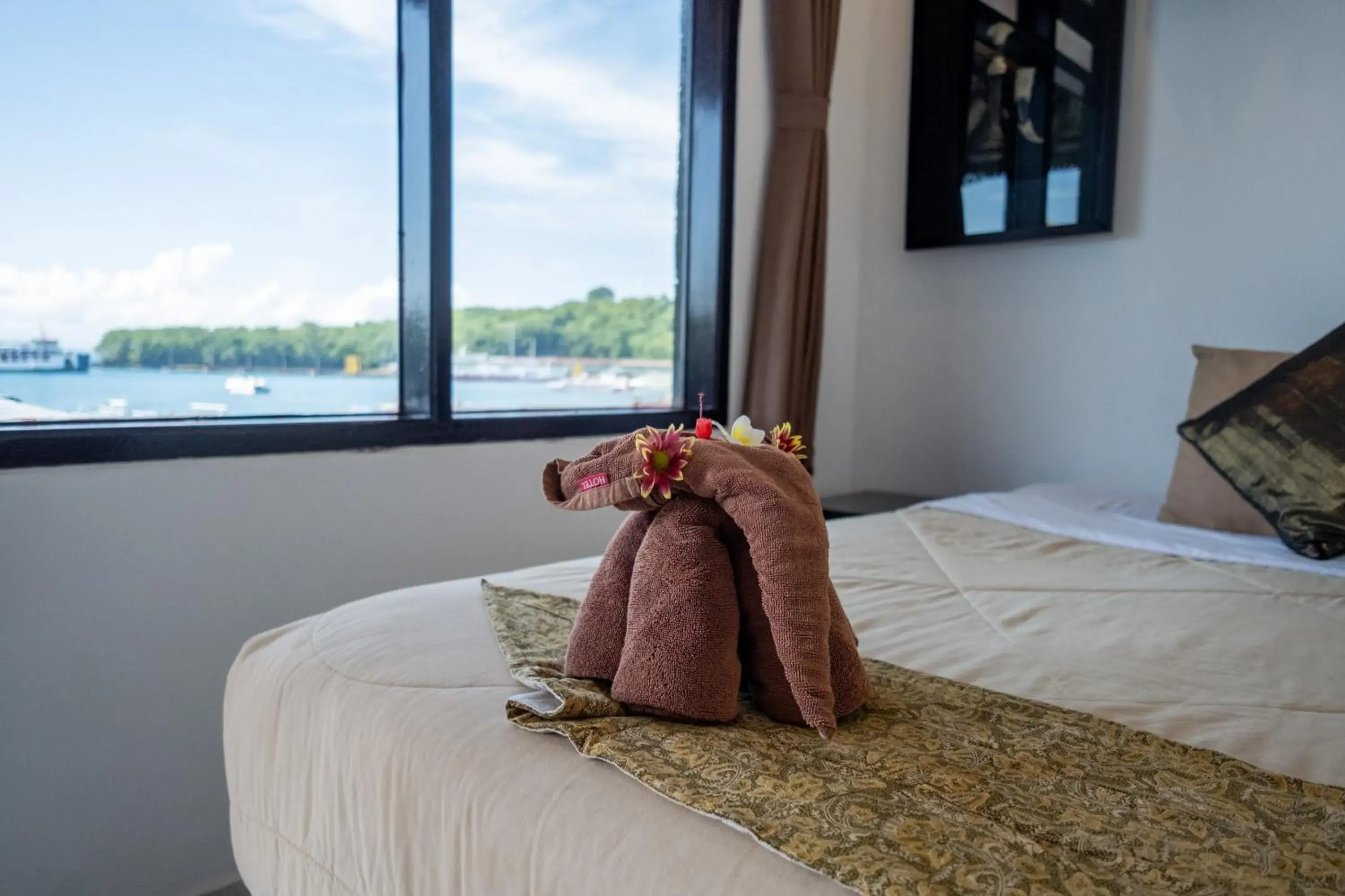 Bed in Absolute Scuba Bali Dive Resort Bed in Absolute Scuba Bali Dive Resort