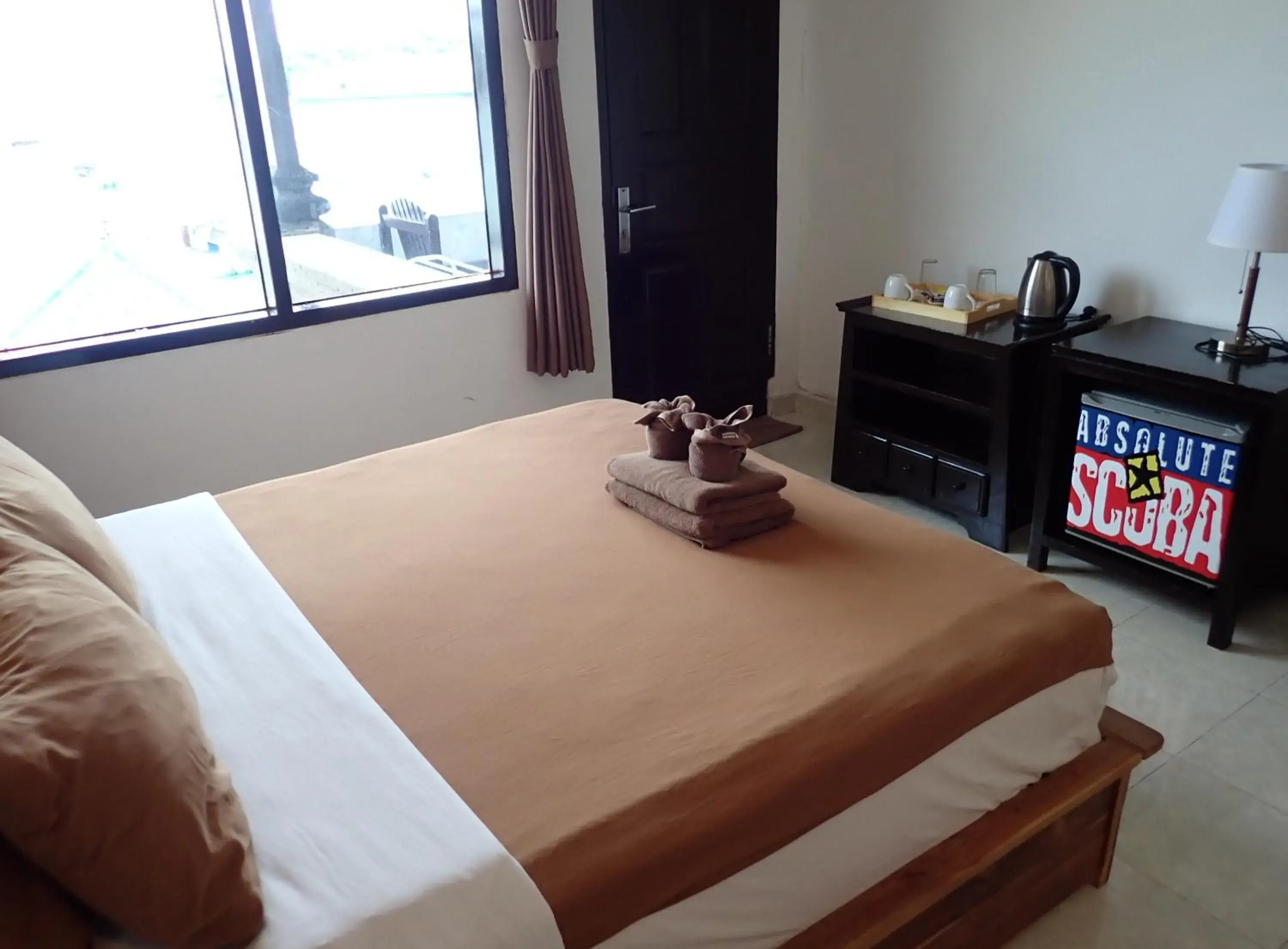 Bed in Absolute Scuba Bali Dive Resort Bed in Absolute Scuba Bali Dive Resort