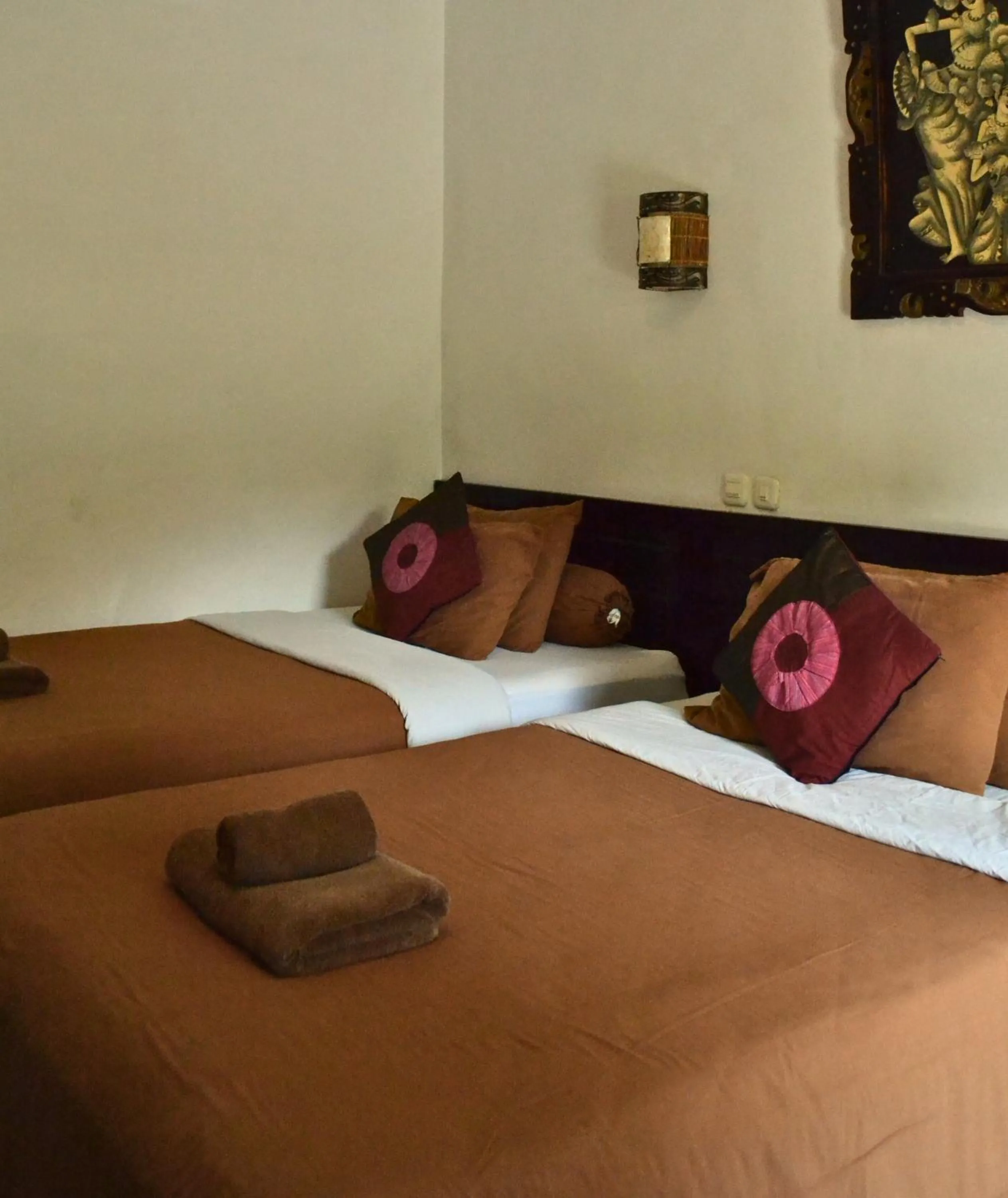 Bed in Absolute Scuba Bali Dive Resort