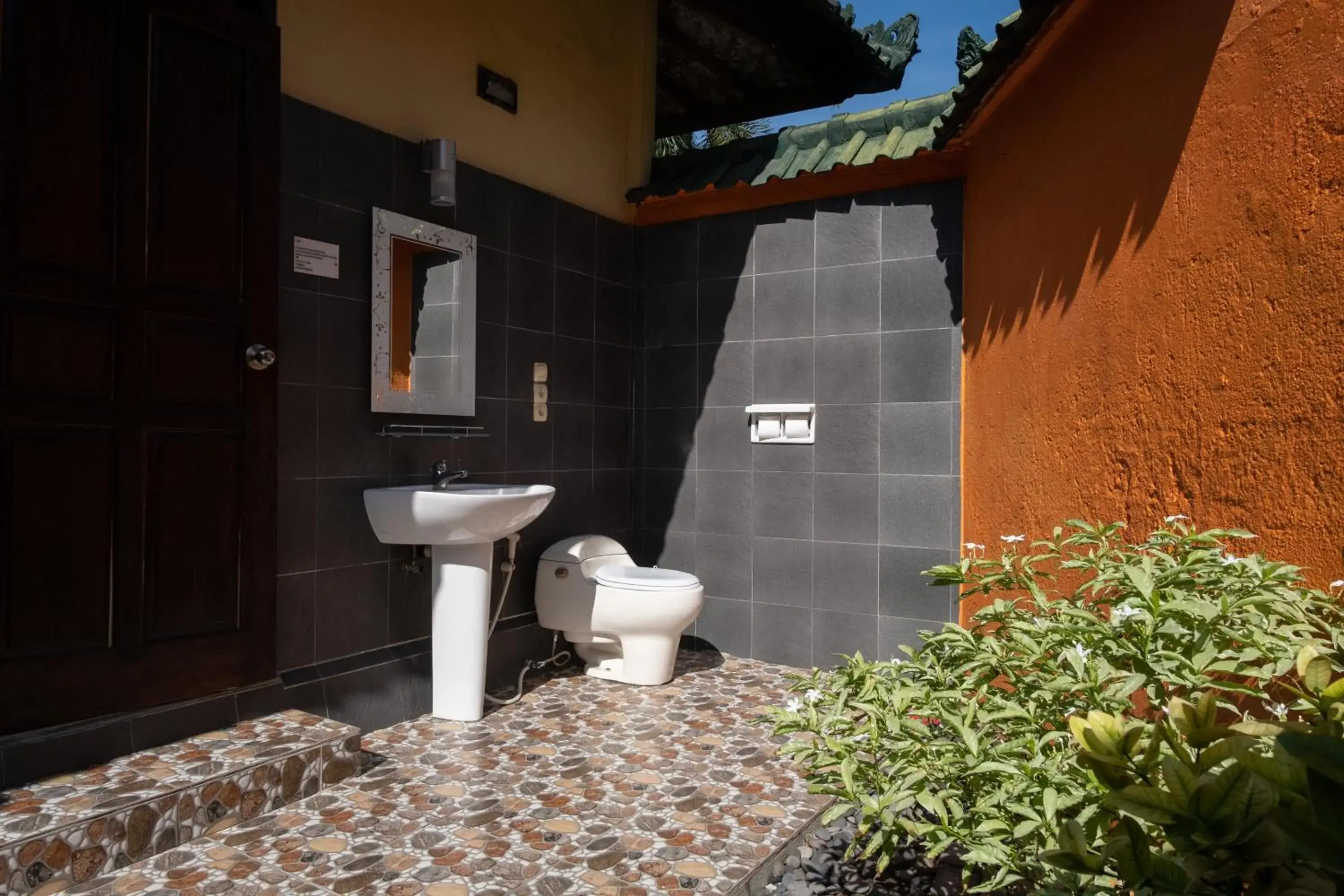 Bathroom in Absolute Scuba Bali Dive Resort Bathroom in Absolute Scuba Bali Dive Resort