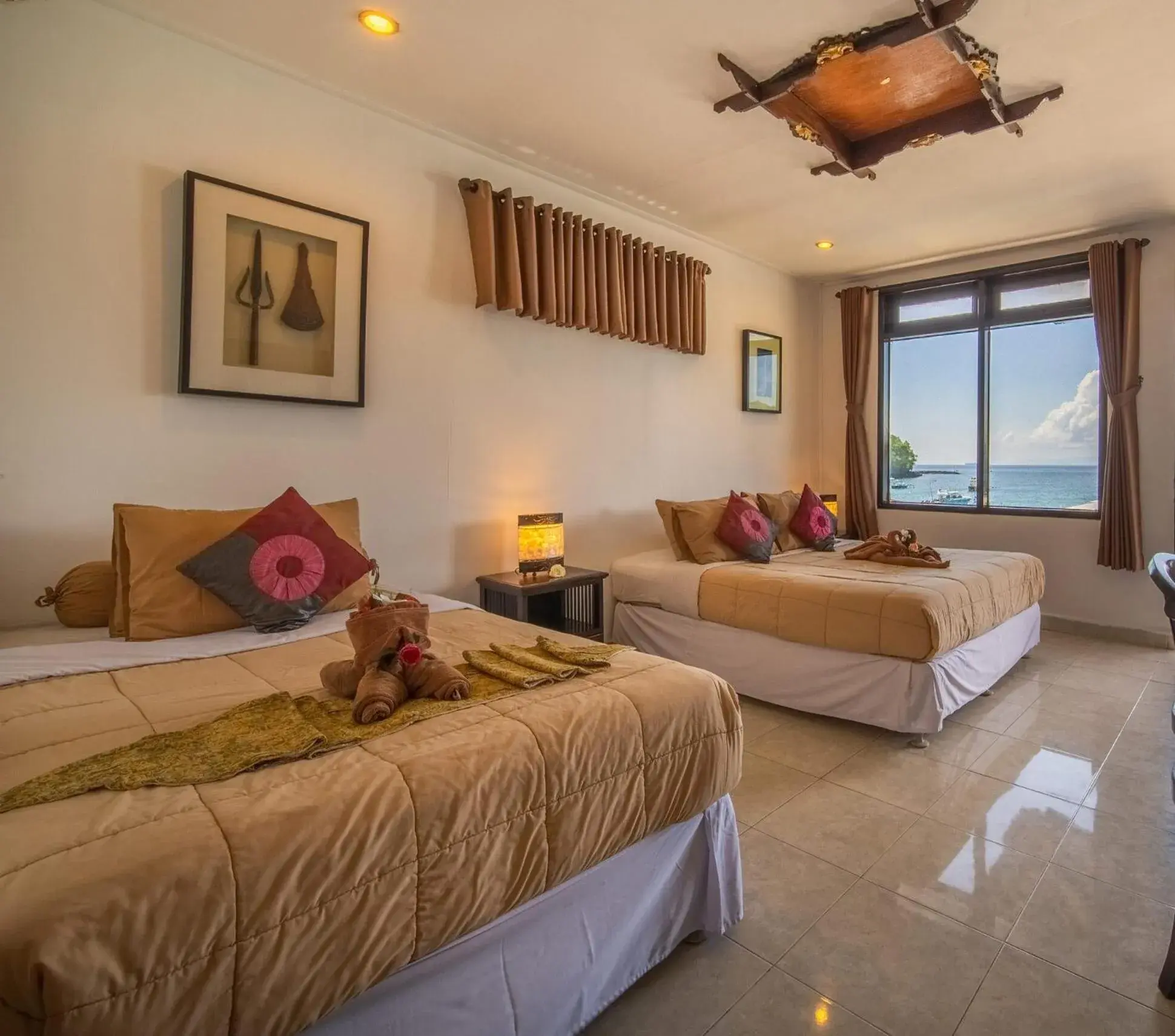 Bed in Absolute Scuba Bali Dive Resort Bed in Absolute Scuba Bali Dive Resort