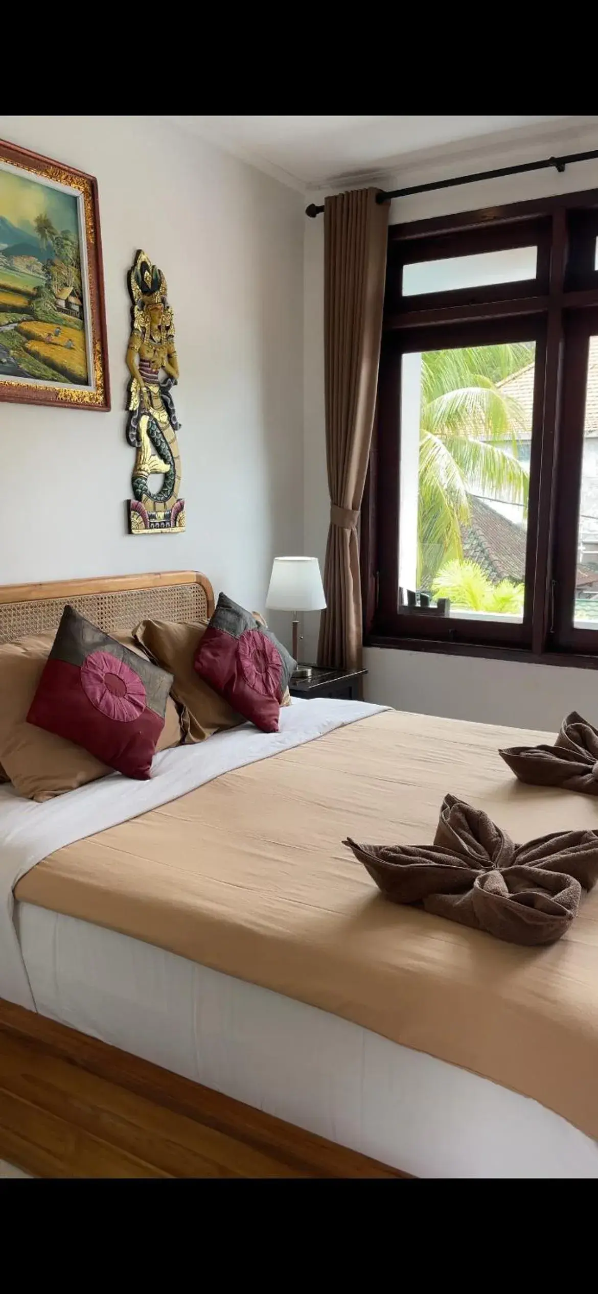 Bed in Absolute Scuba Bali Dive Resort Bed in Absolute Scuba Bali Dive Resort