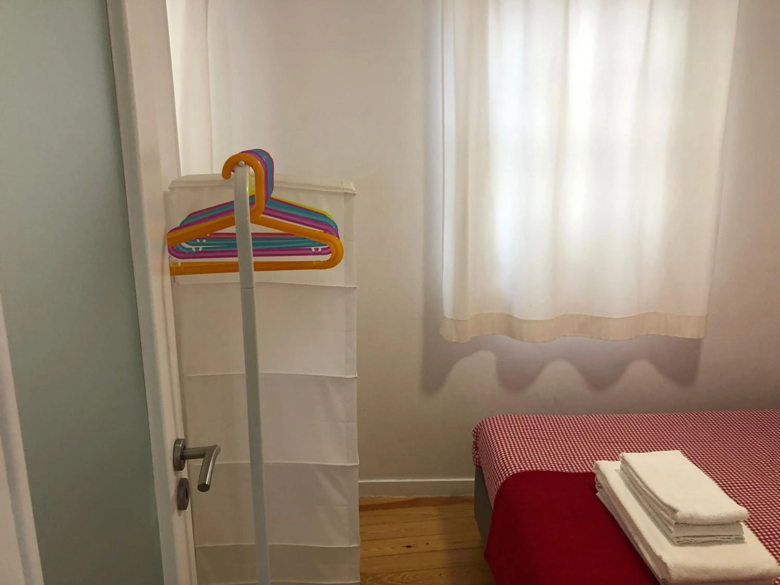 wardrobe, Bed in Casa do Garcês by Lisbon Village Apartments