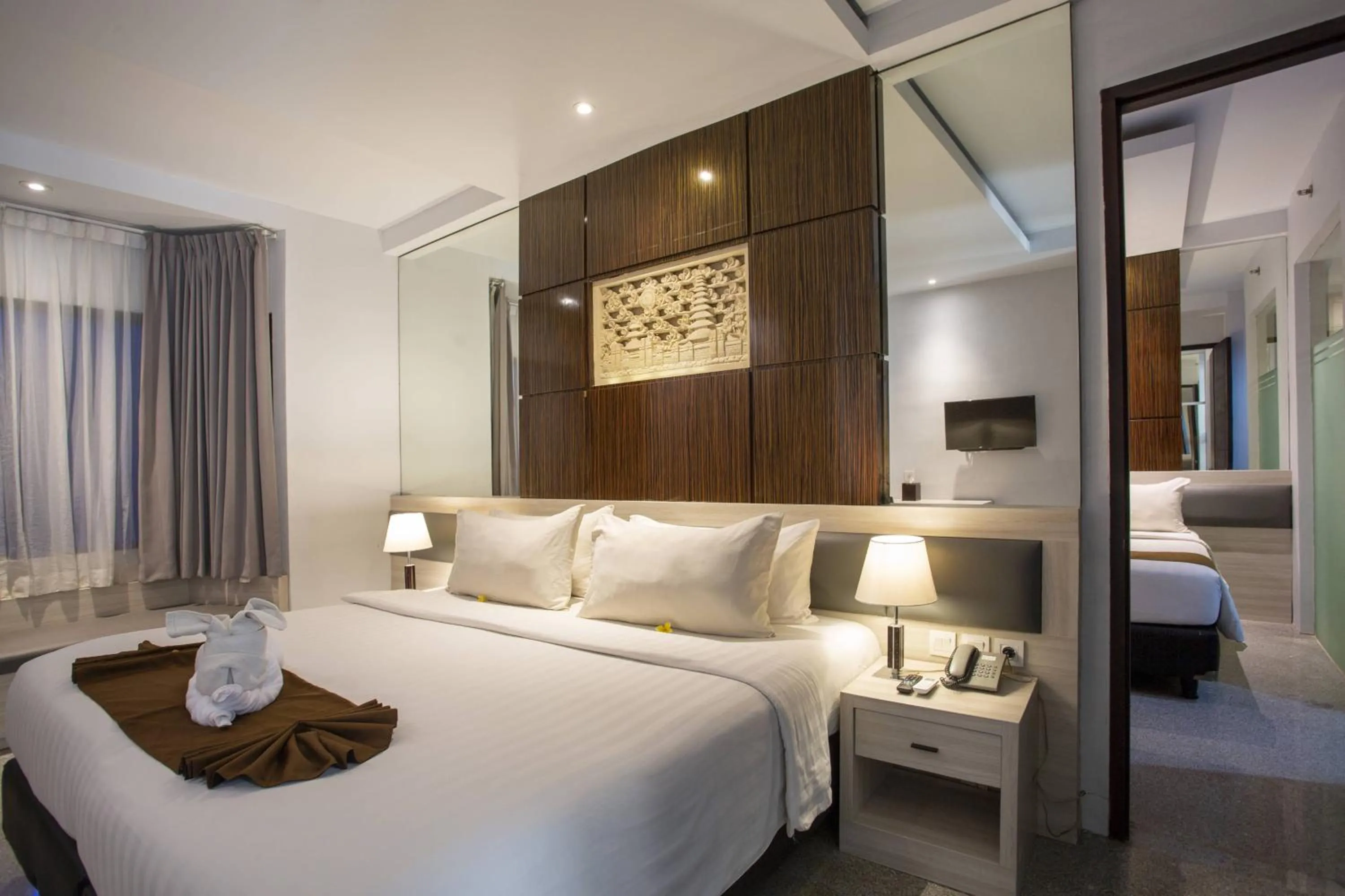 Bed in Famous Hotel Kuta Formerly Permata Kuta Hotel