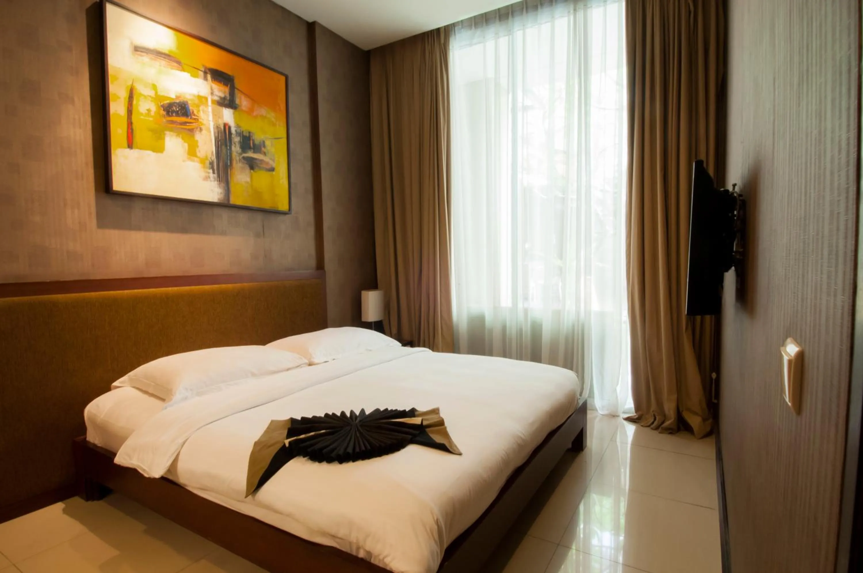 Bedroom in 100 Sunset Boutique