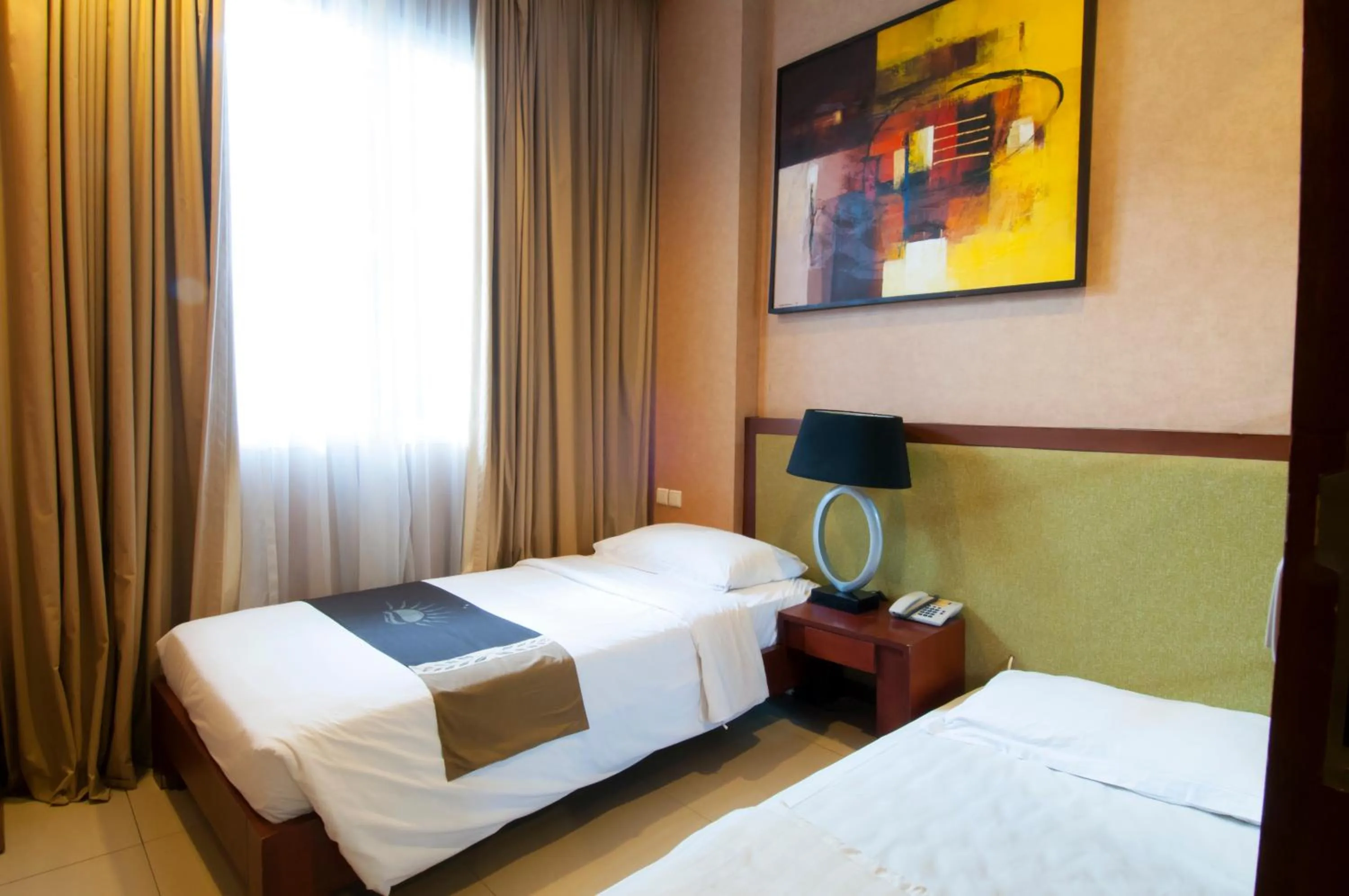 Bedroom in 100 Sunset Boutique