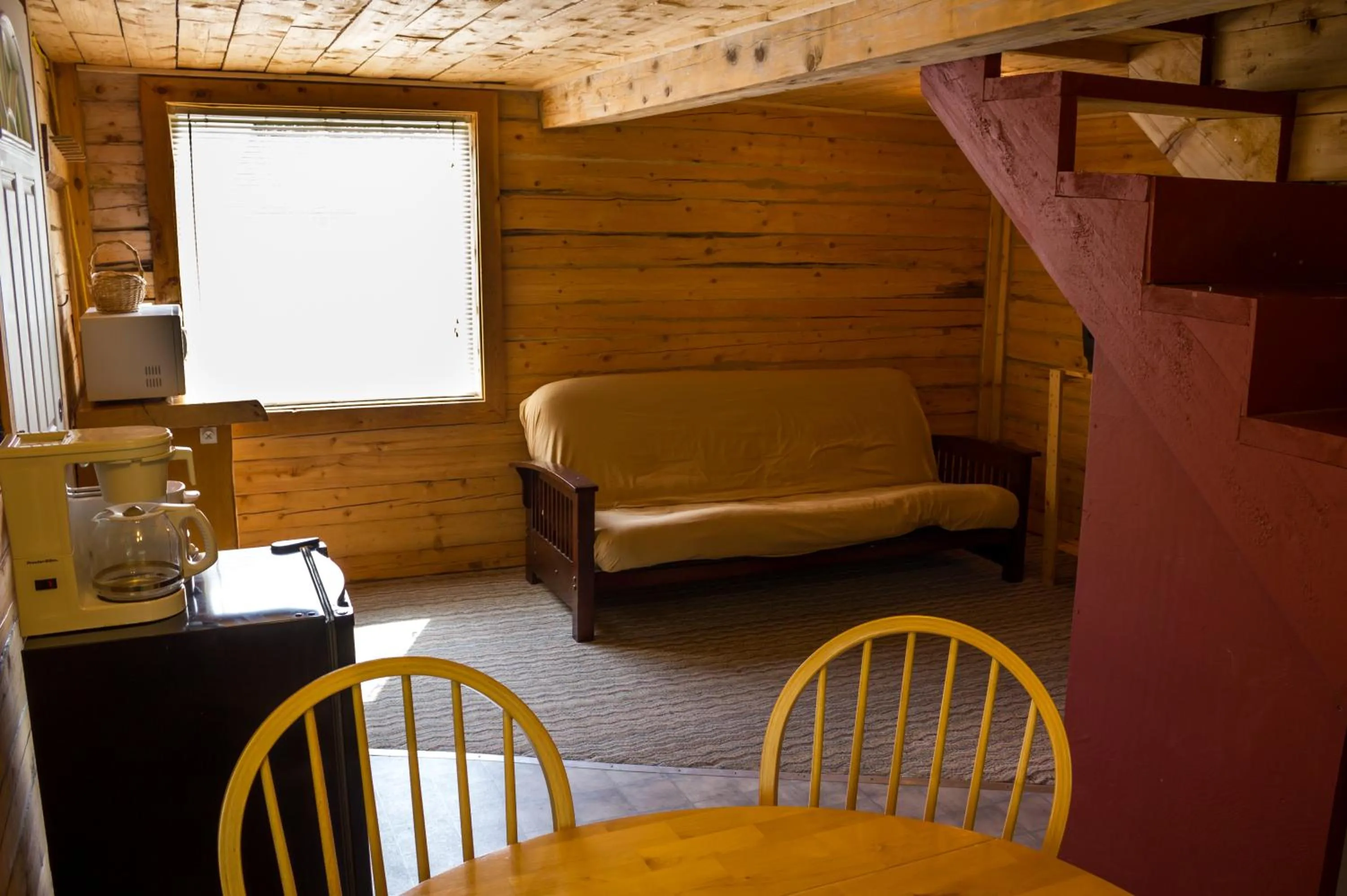 Living room in Midnight Sun Log Cabins
