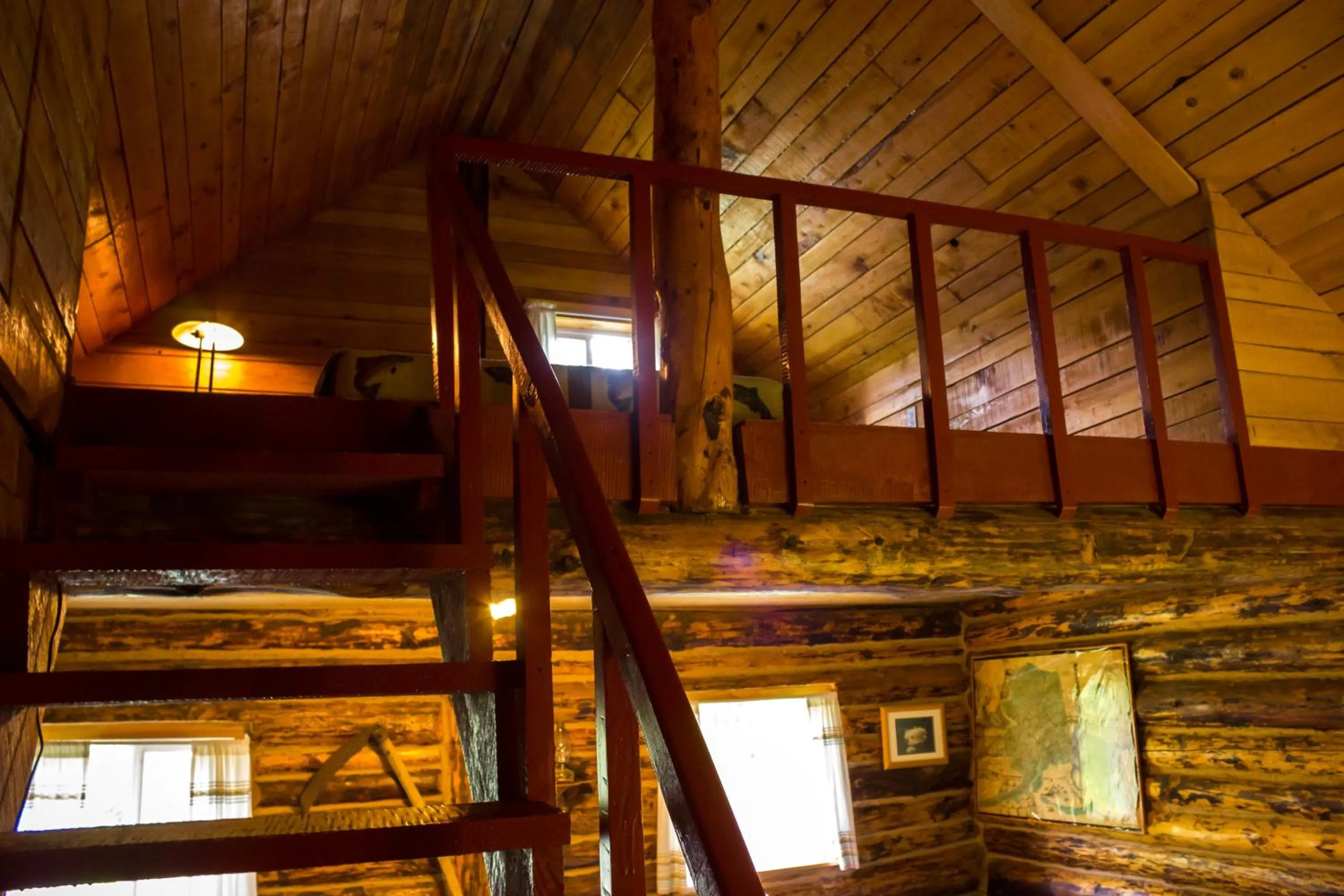 Bed in Midnight Sun Log Cabins