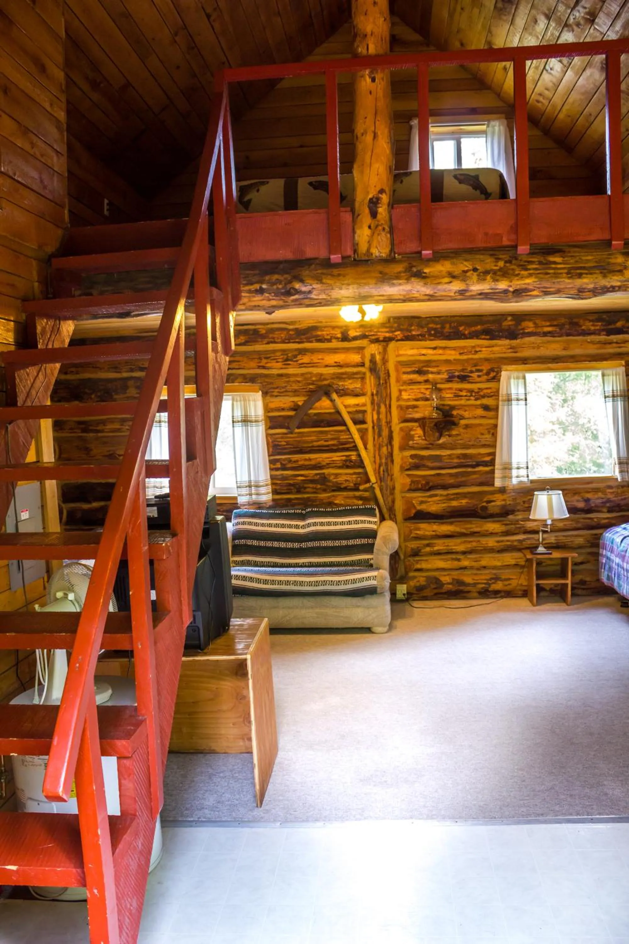 Bed in Midnight Sun Log Cabins