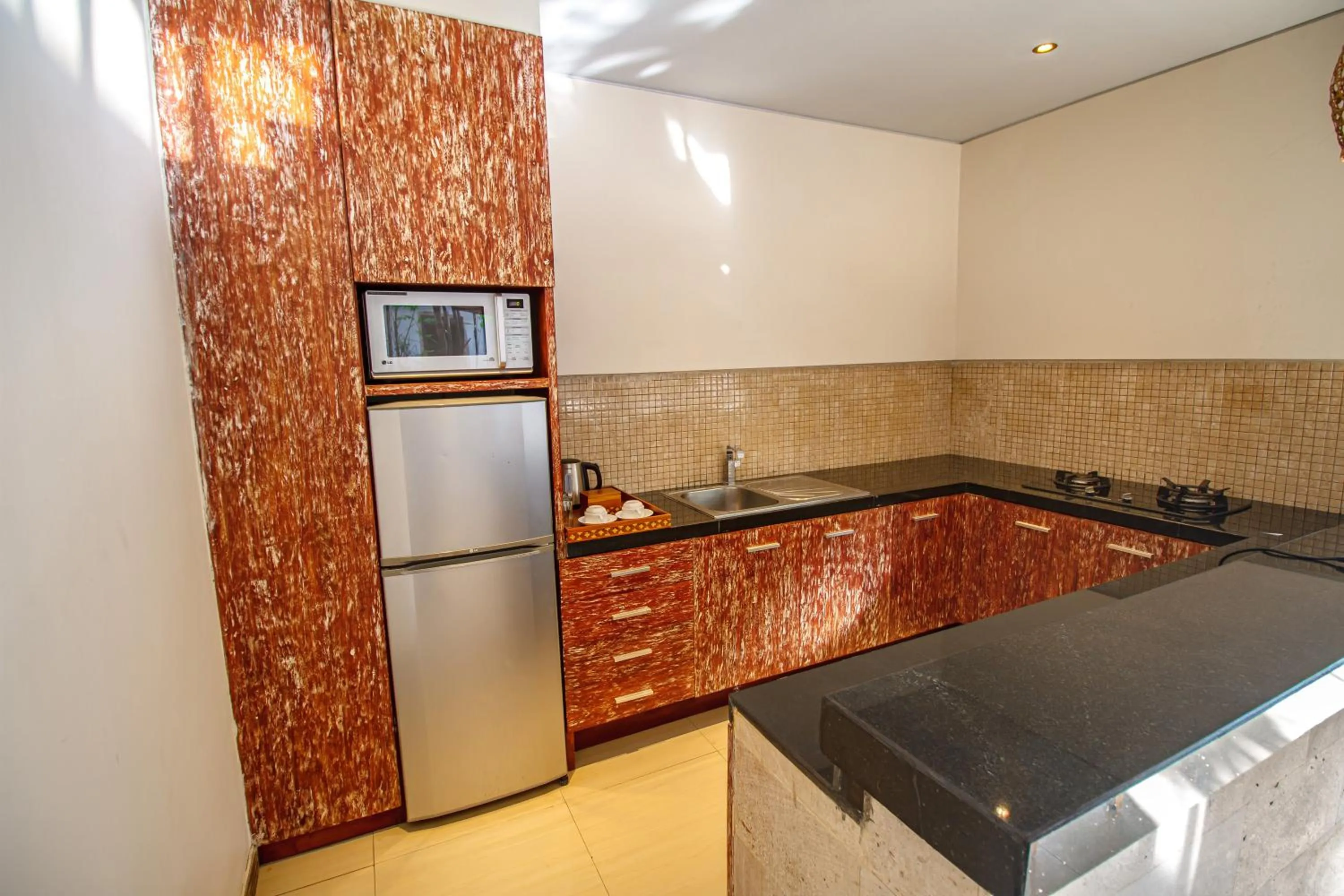Kitchen or kitchenette in The Wolas Villas