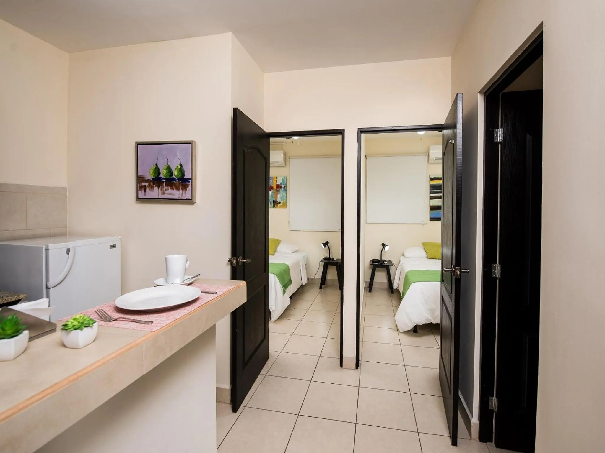 Kitchen or kitchenette, Bed in Verona ApartHotel