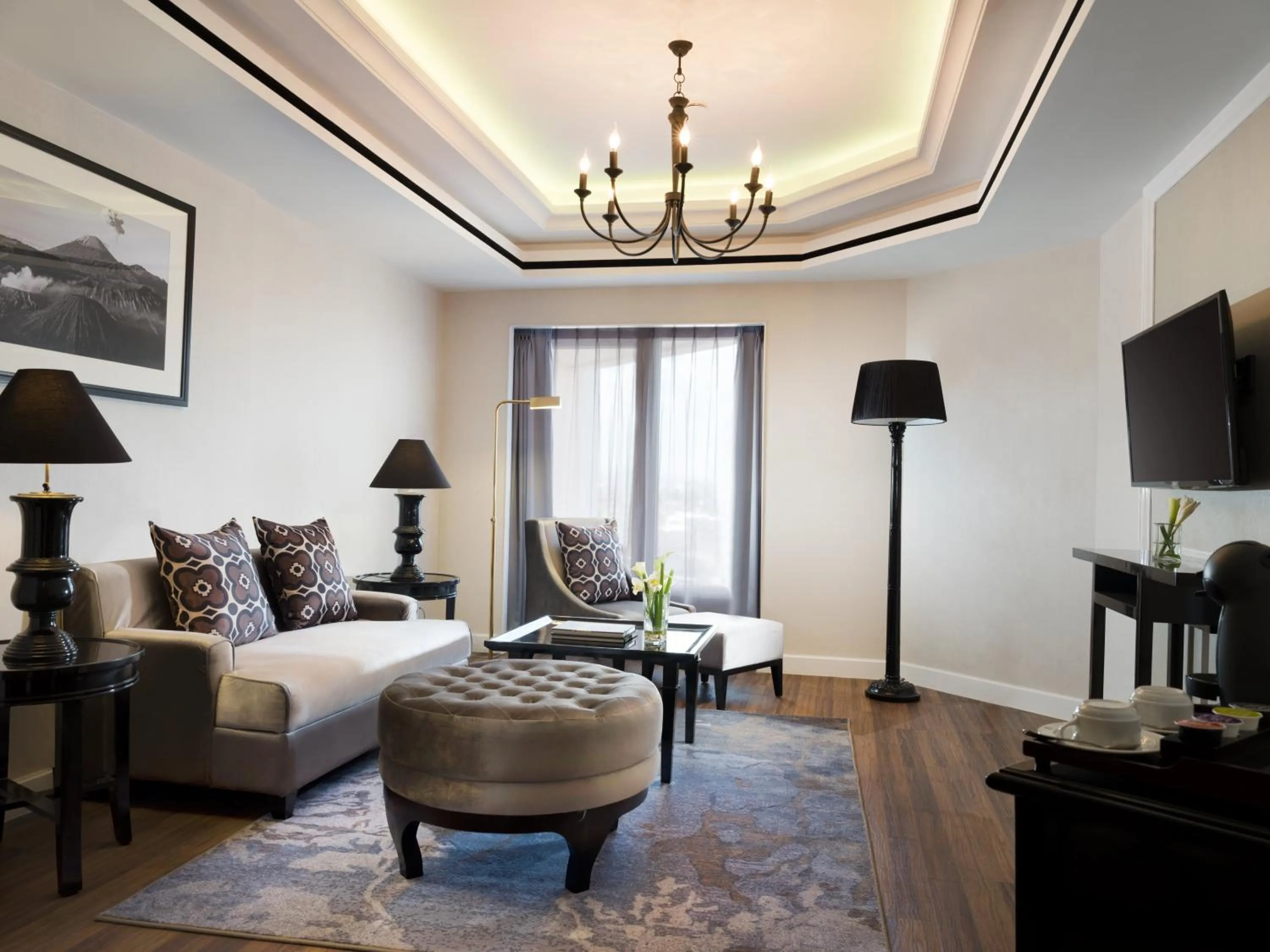 Living room, Bed in Melia Purosani Yogyakarta