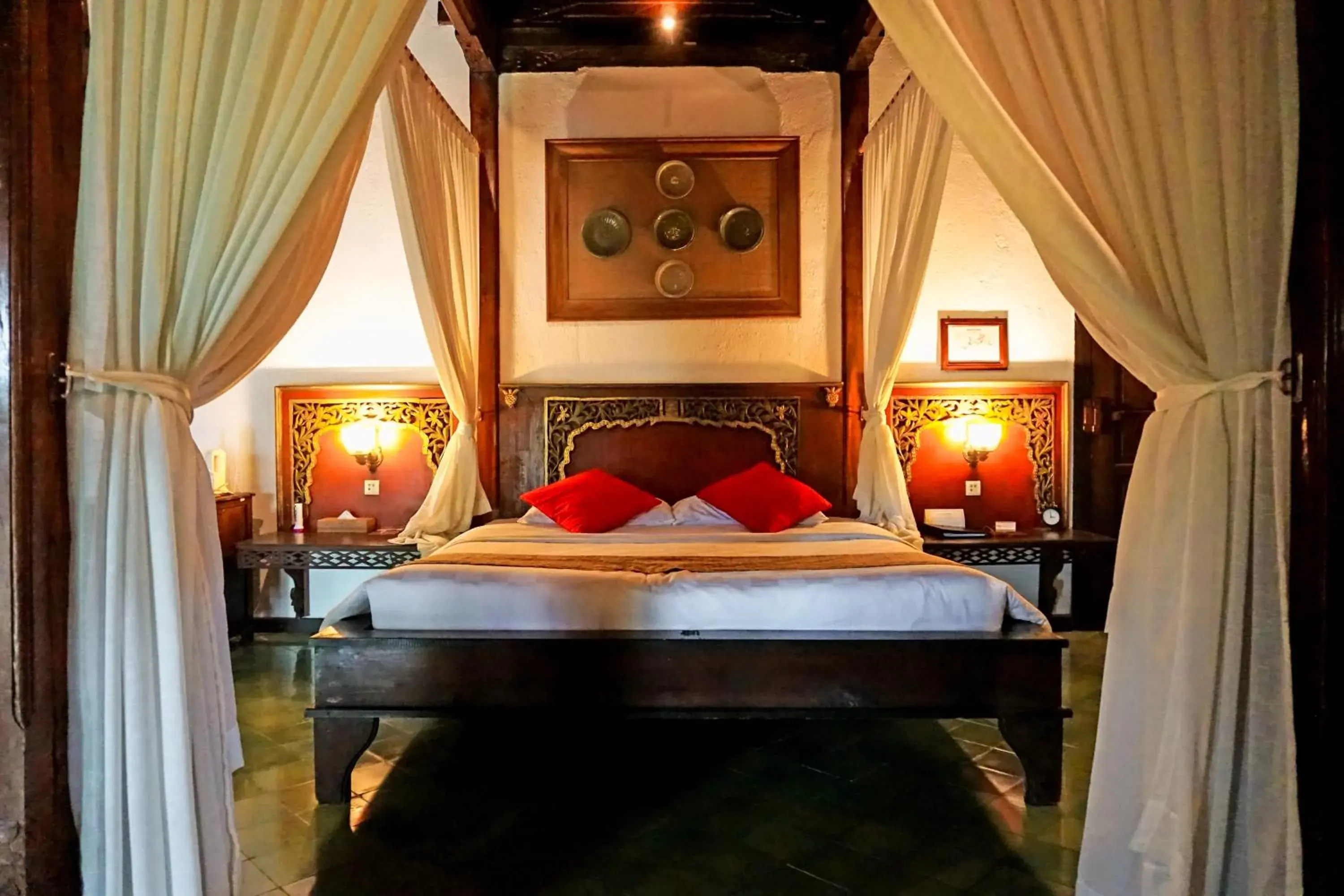 Bed in MesaStila Resort and Spa Bed in MesaStila Resort and Spa
