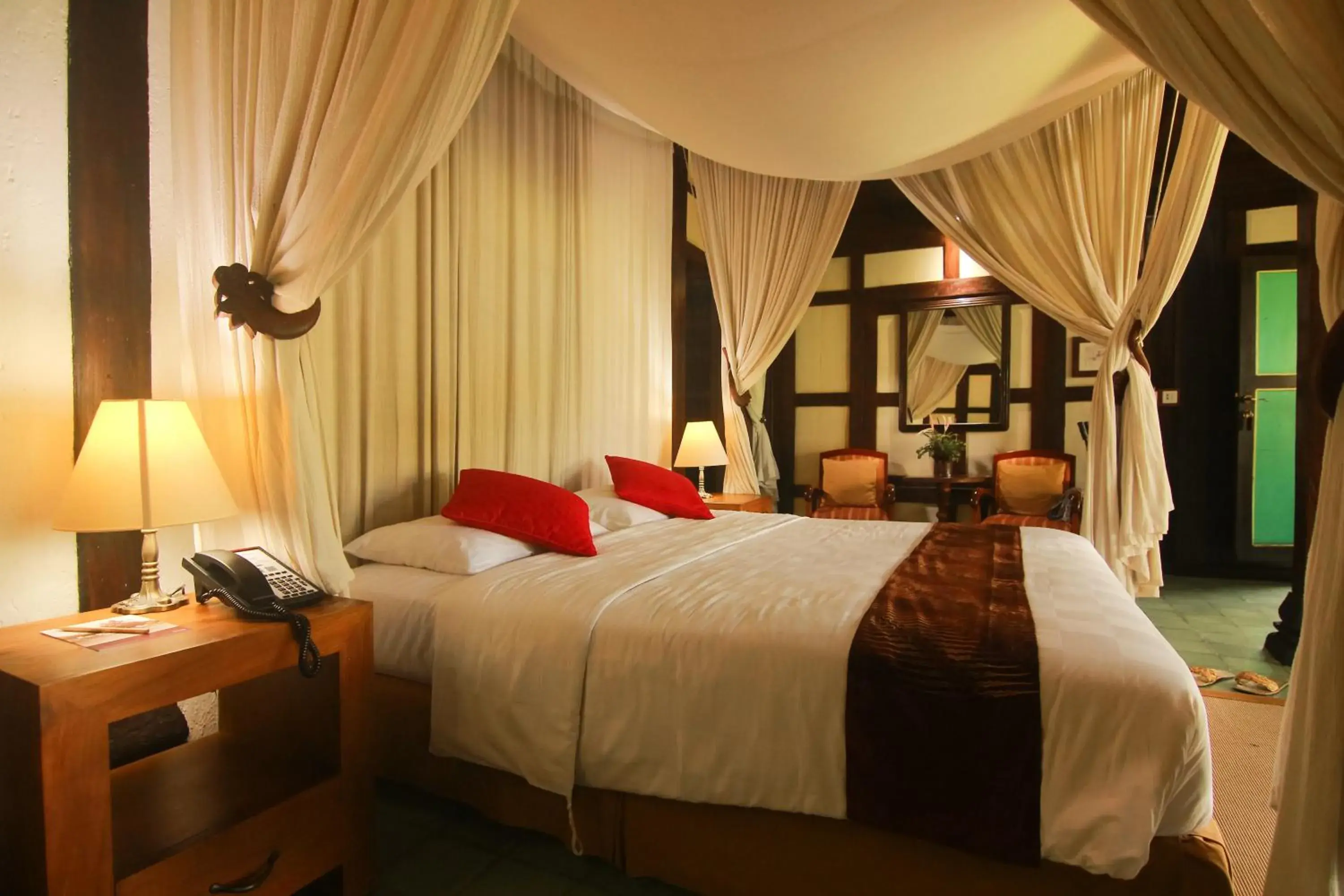 Bed in MesaStila Resort and Spa Bed in MesaStila Resort and Spa