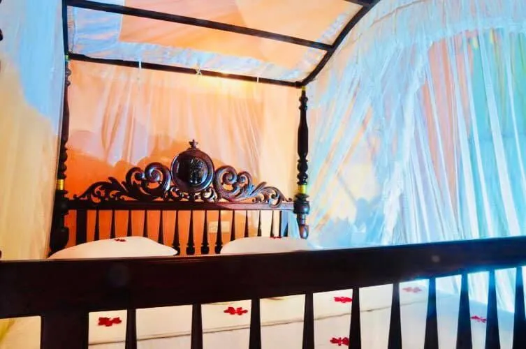 Bed in Hareesha Holiday Resort