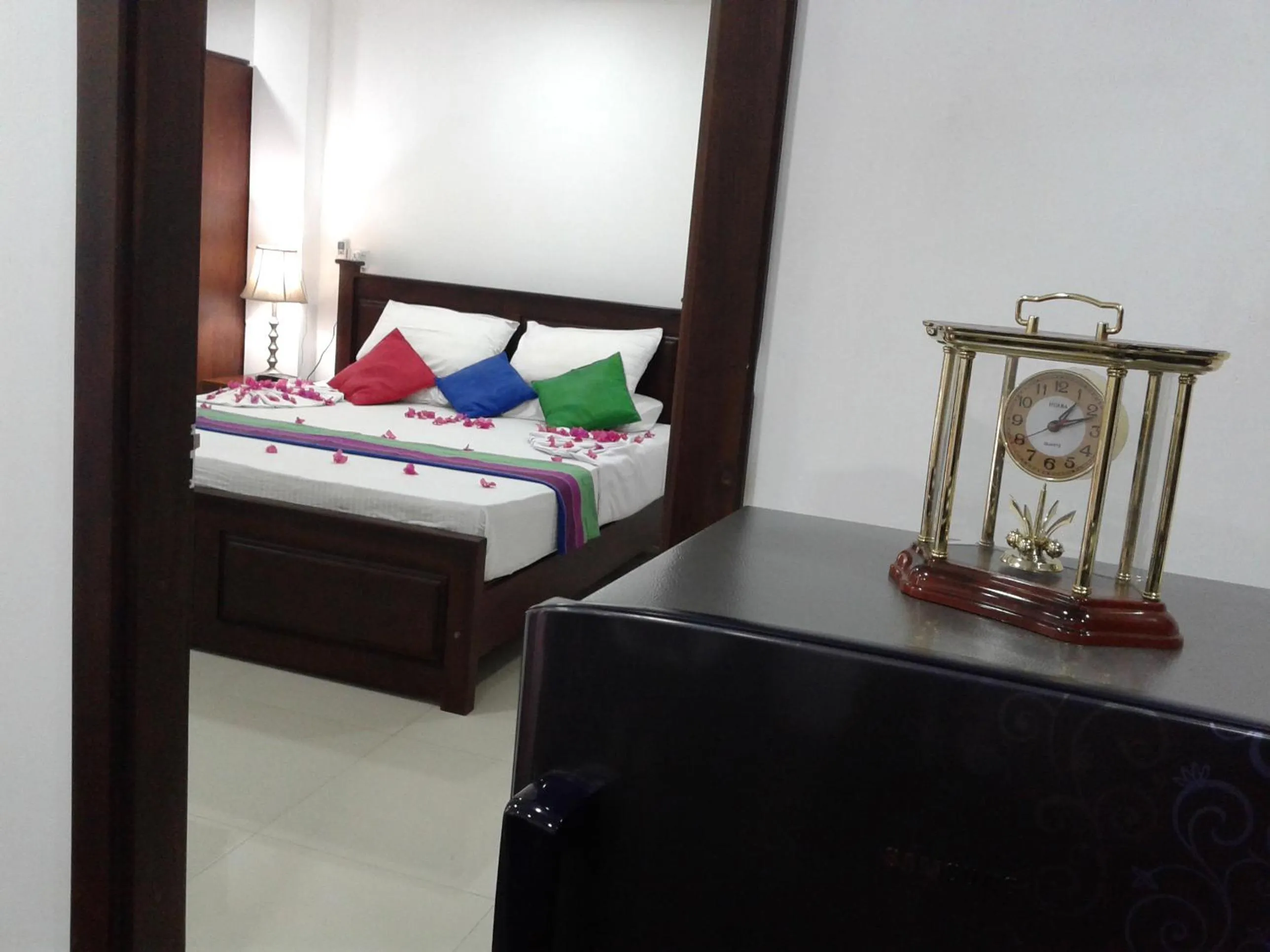 Bed in Hareesha Holiday Resort