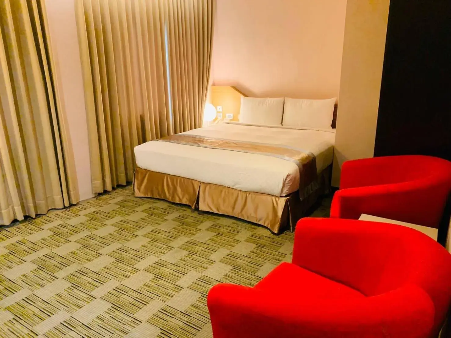 Bed in Kaishen Sinsu Hotel Bed in Kaishen Sinsu Hotel