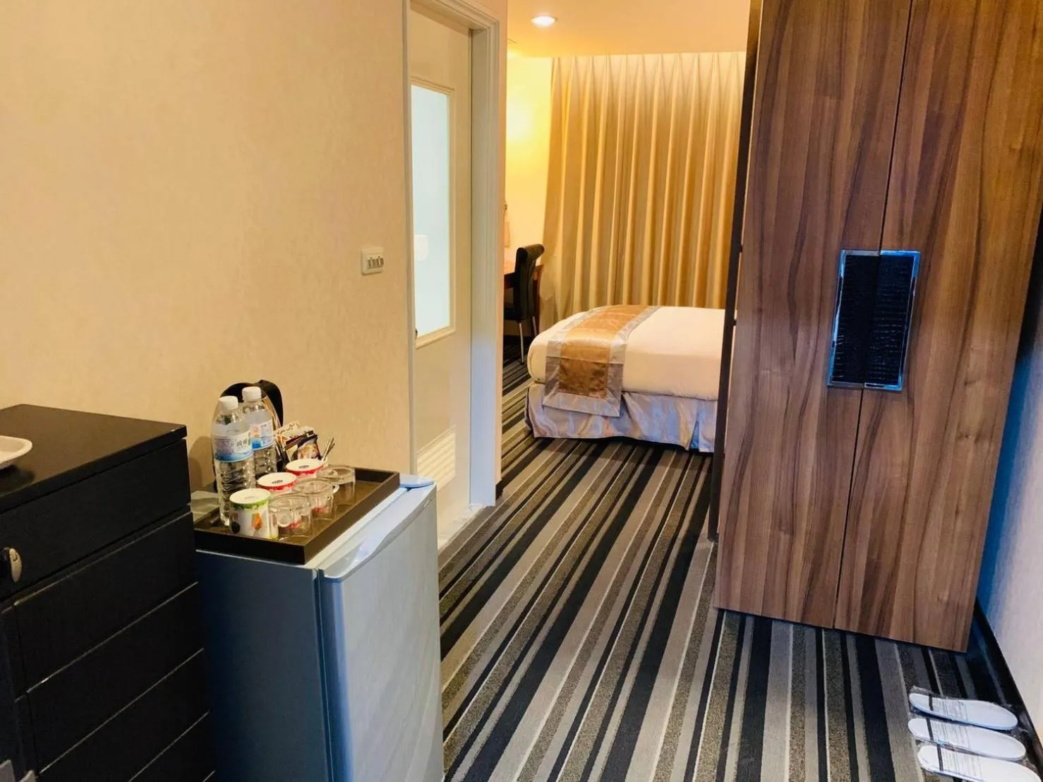 Bed in Kaishen Sinsu Hotel