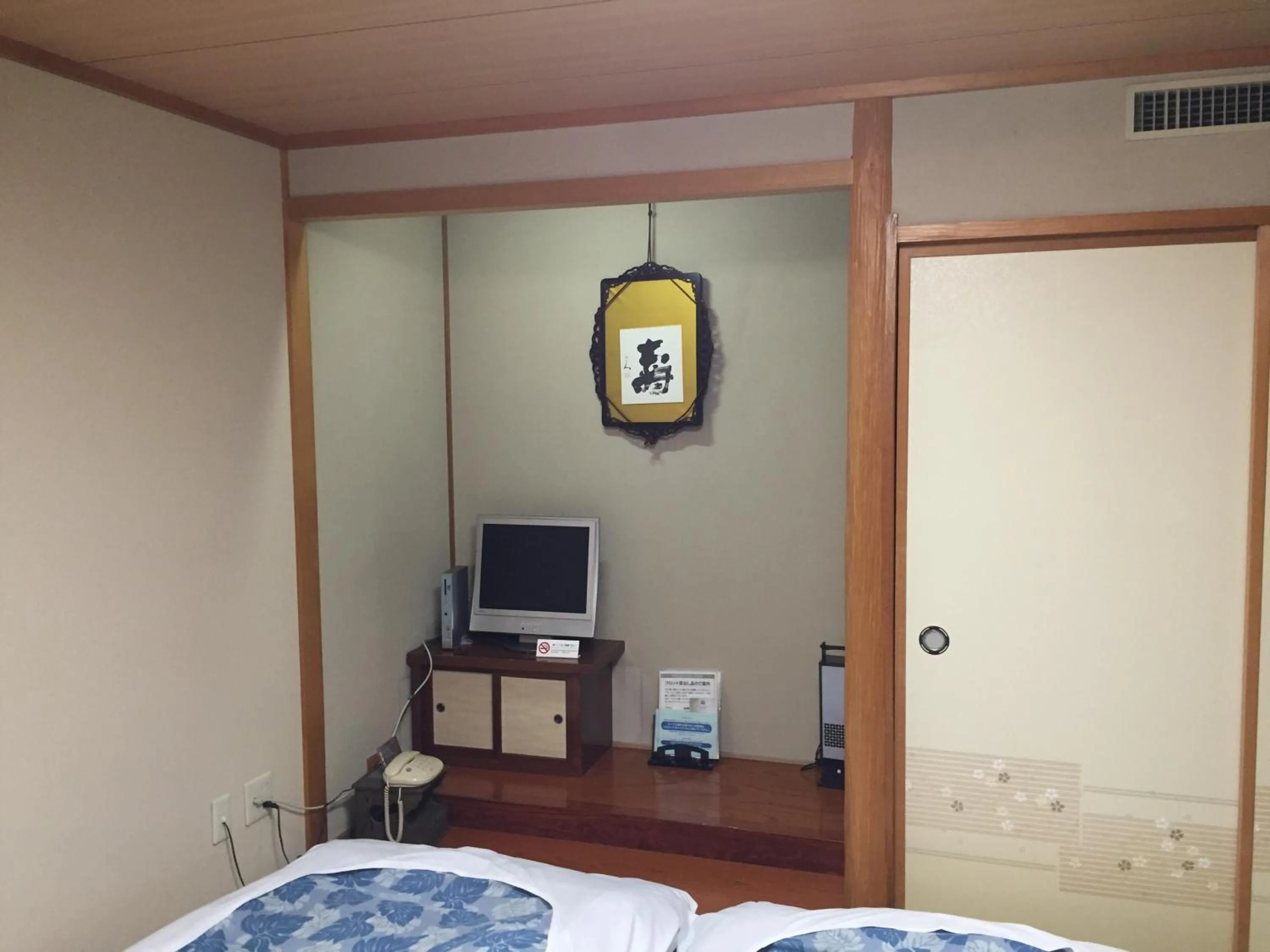 Photo of the whole room, Bed in Hotel Crown Hills Kitami