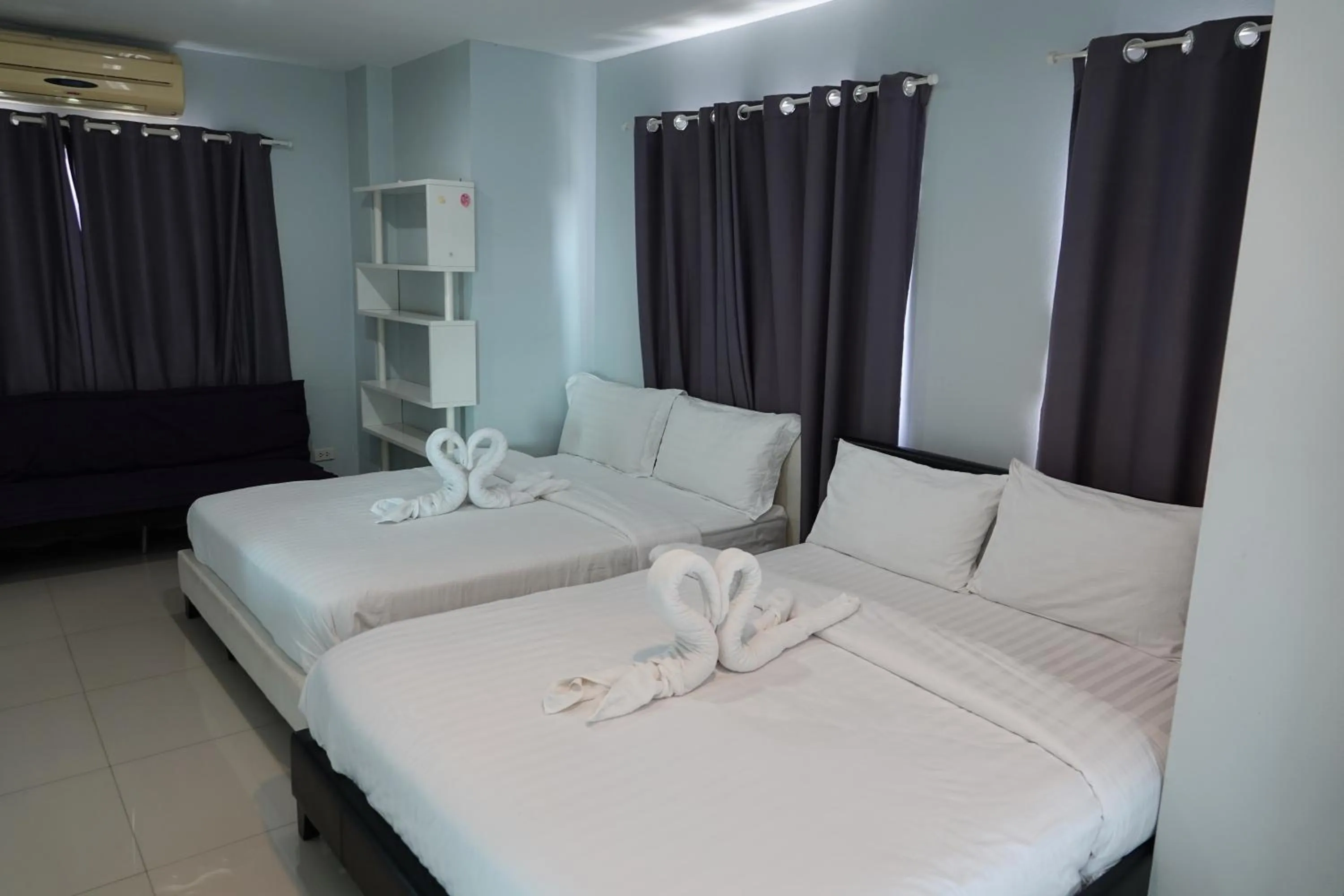 Bed in ibeyond Apartment Romklao Suvarnabhumi