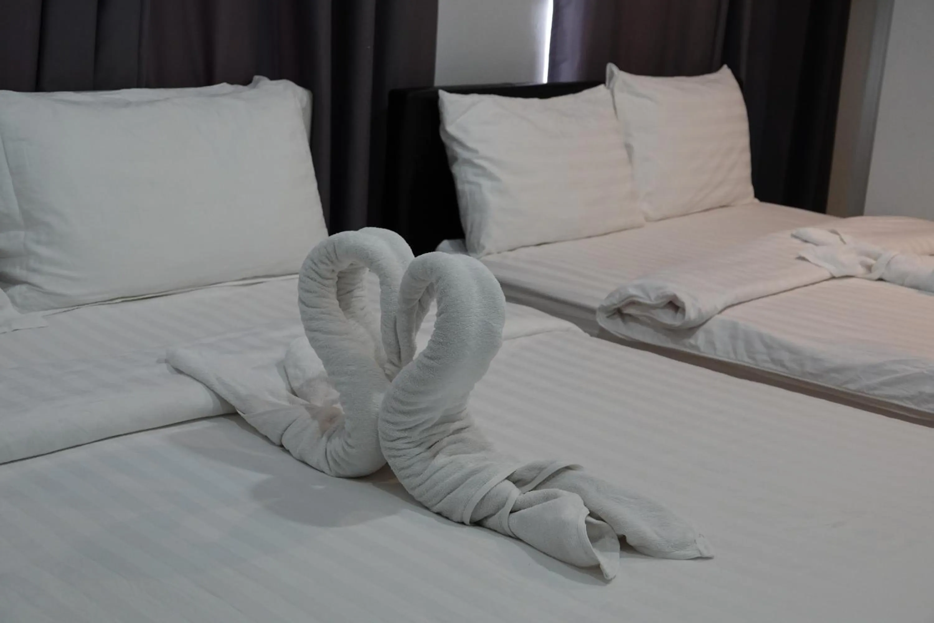 Bed in ibeyond Apartment Romklao Suvarnabhumi