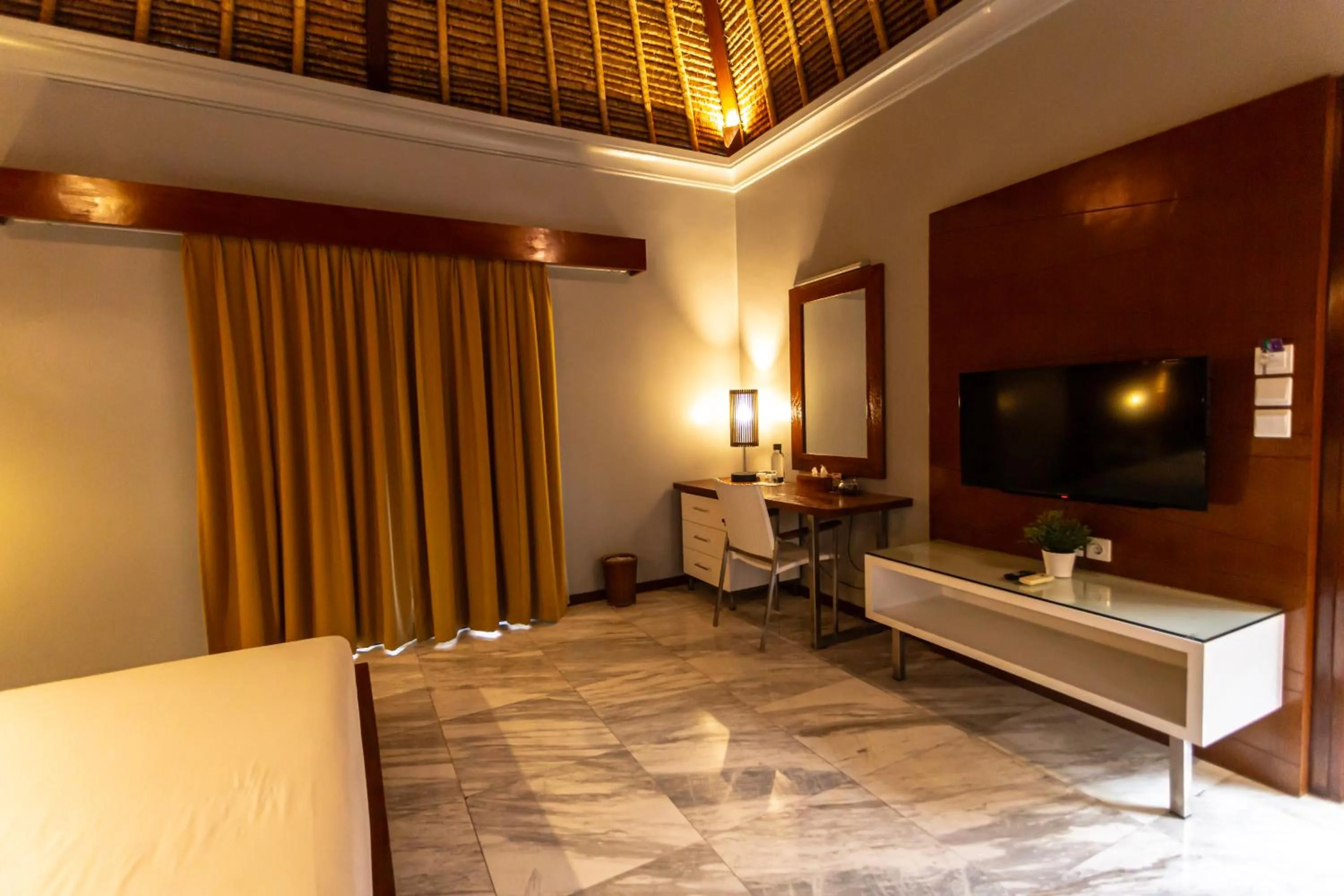 Communal lounge/ TV room, Bed in Abi Bali Resort and Villa