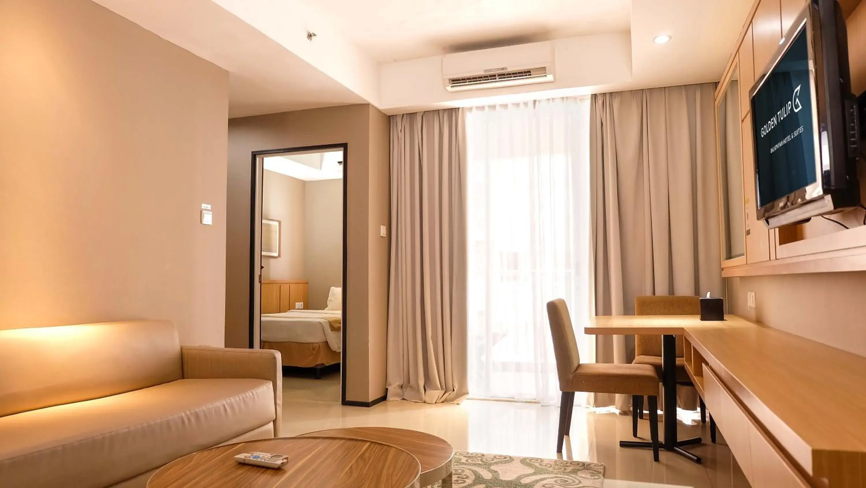 Living room, Bed in Golden Tulip Balikpapan Hotel & Suites Living room, Bed in Golden Tulip Balikpapan Hotel & Suites