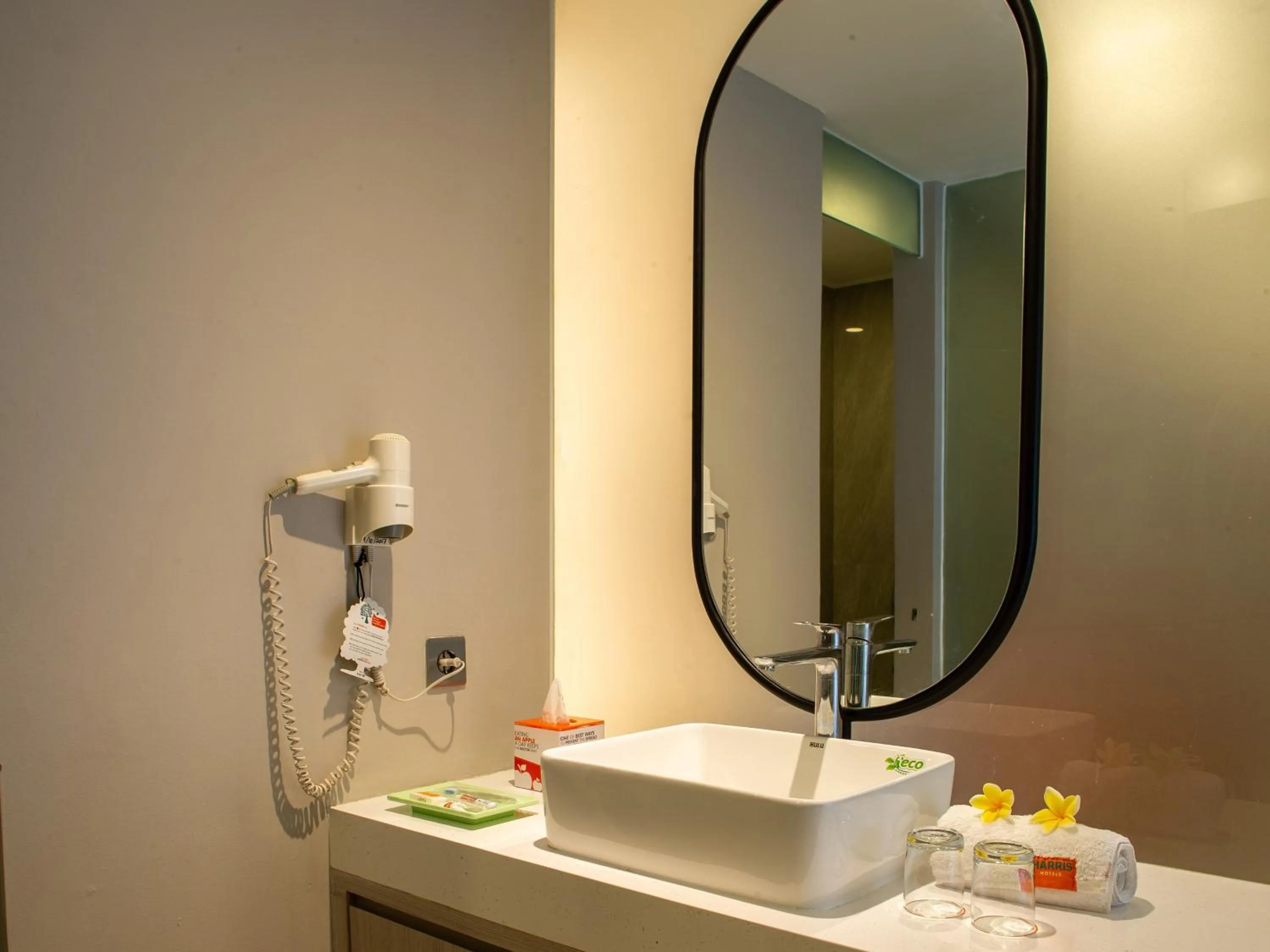 Bathroom in HARRIS Hotel & Residences Riverview Kuta, Bali