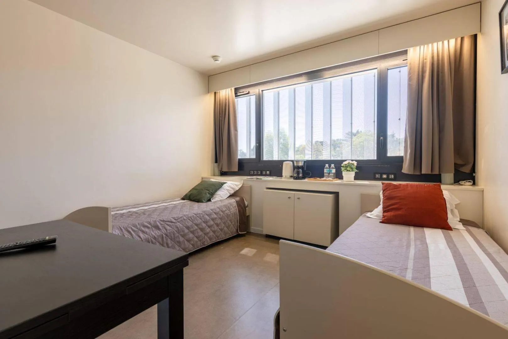 Bed in Study Hôtel Bordeaux Lormont