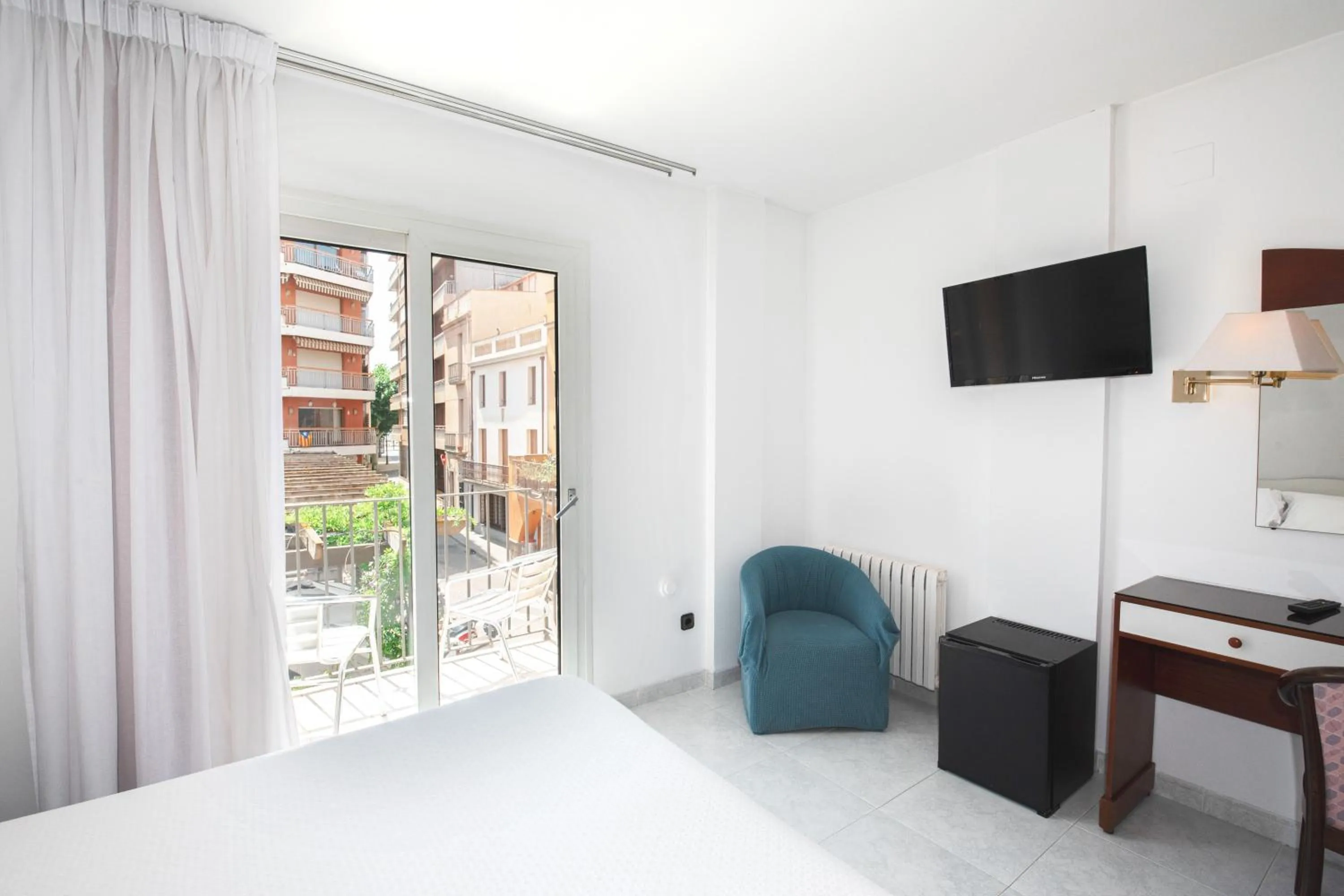 TV and multimedia, Bed in Hotel Plaça