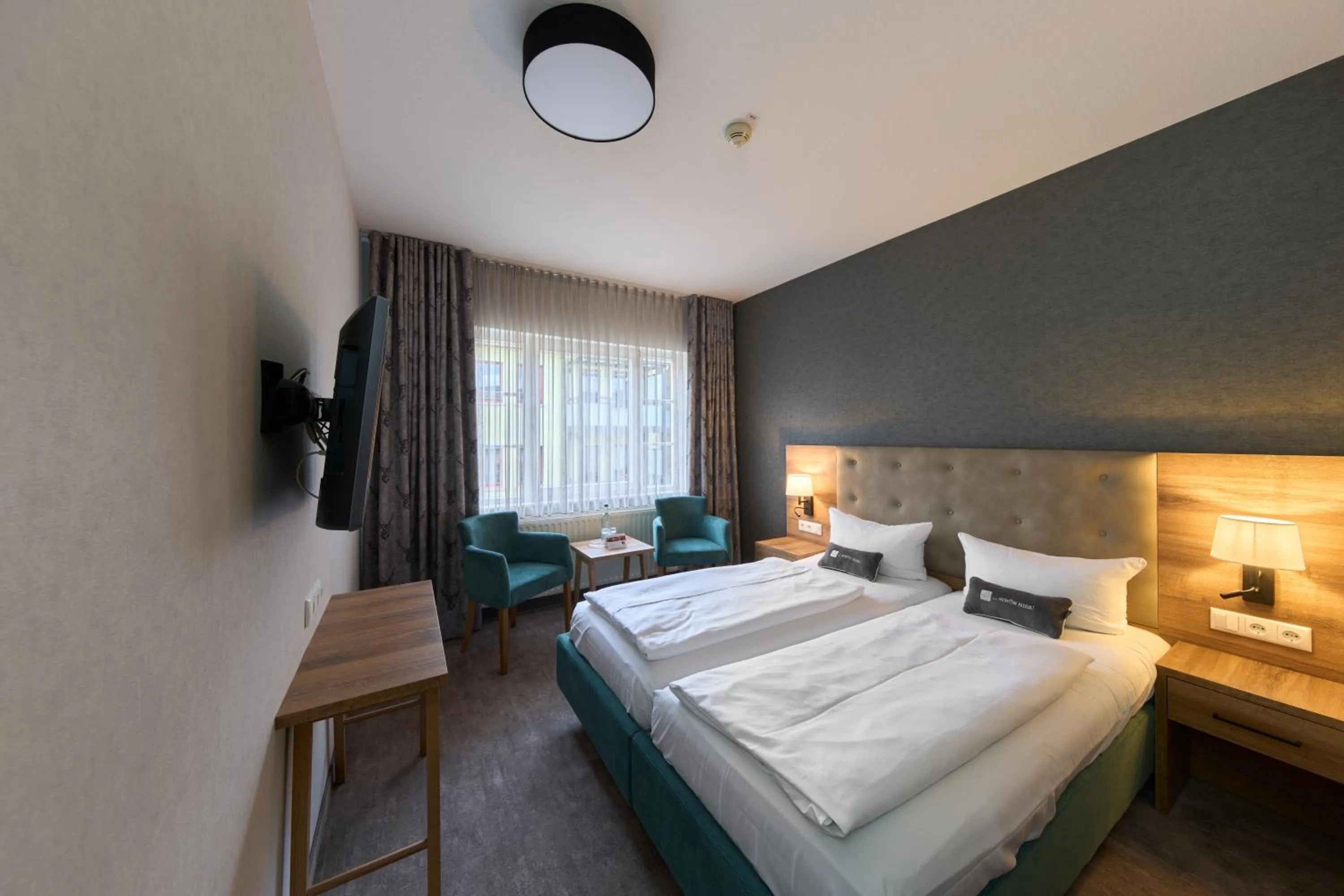 Photo of the whole room, Bed in Brauhaus Zum Löwen