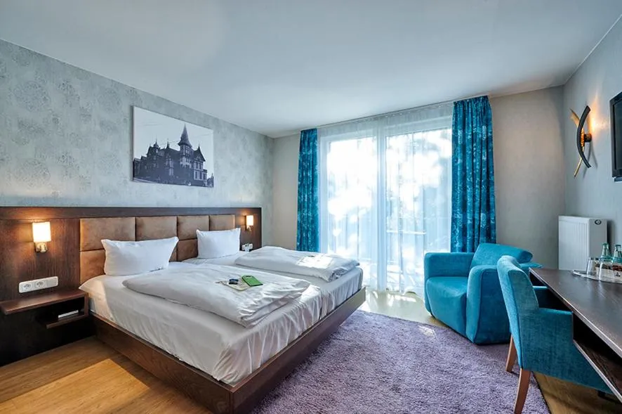 Photo of the whole room, Bed in Brauhaus Zum Löwen