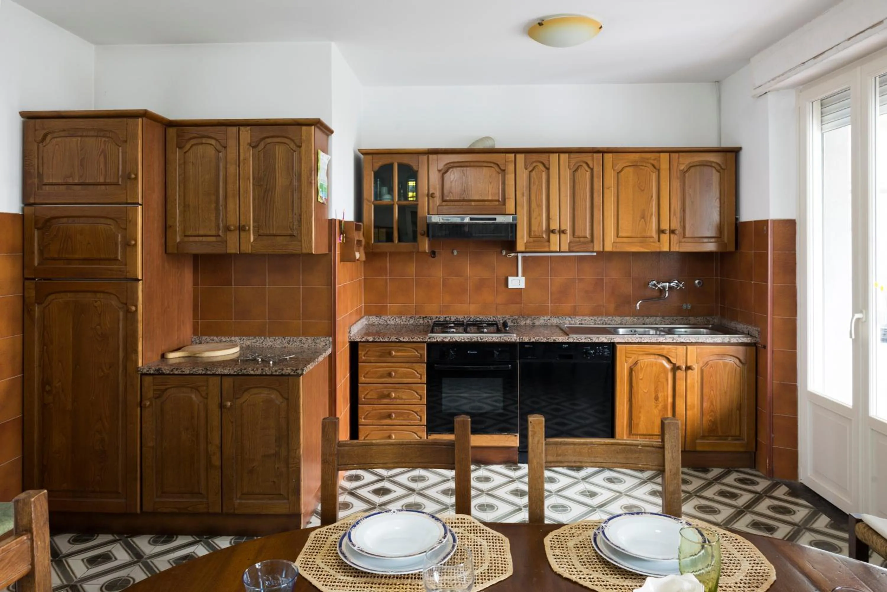 Kitchen or kitchenette in Casa Adriana