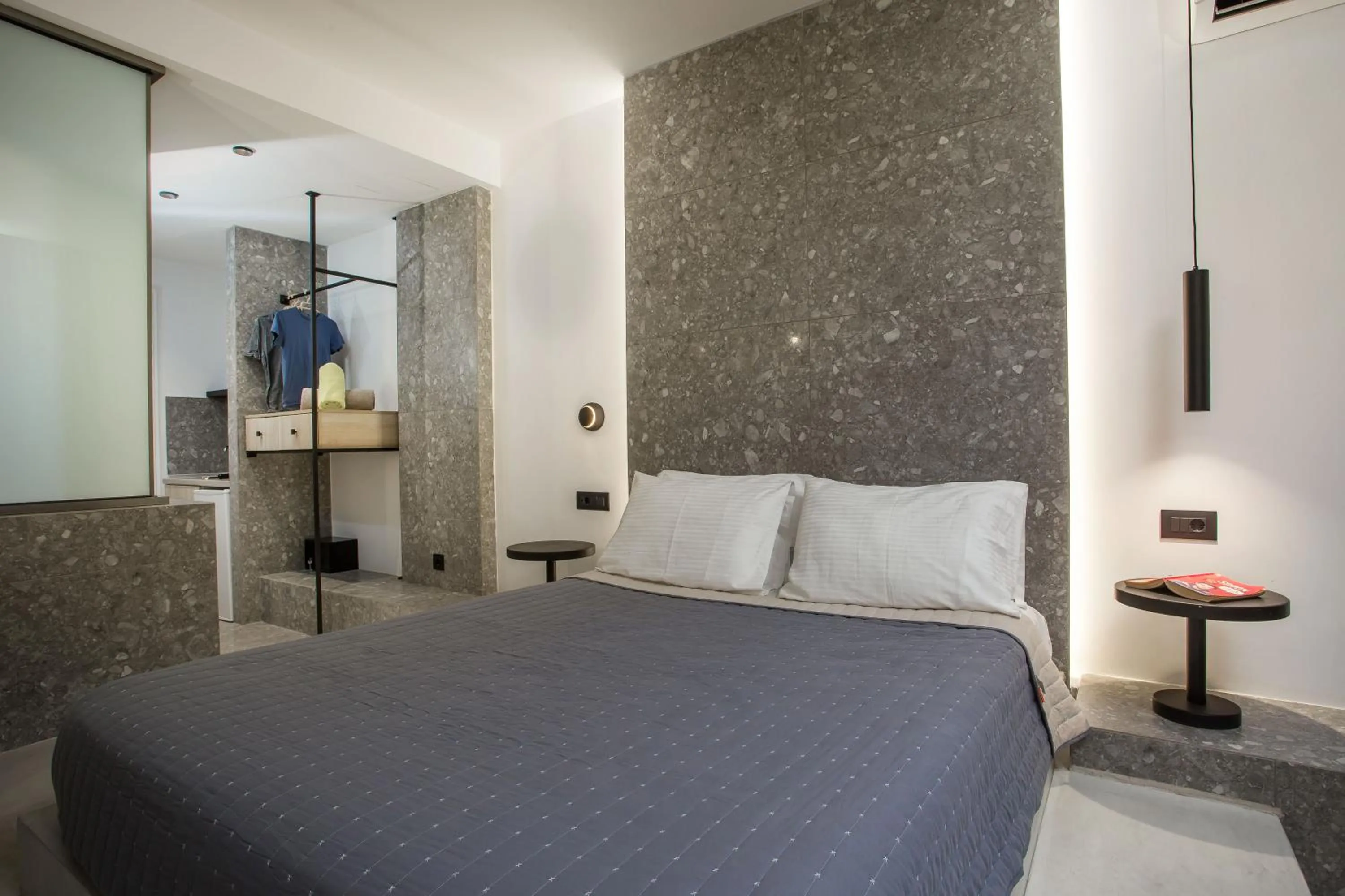 Bed in Dias Studios & Suites