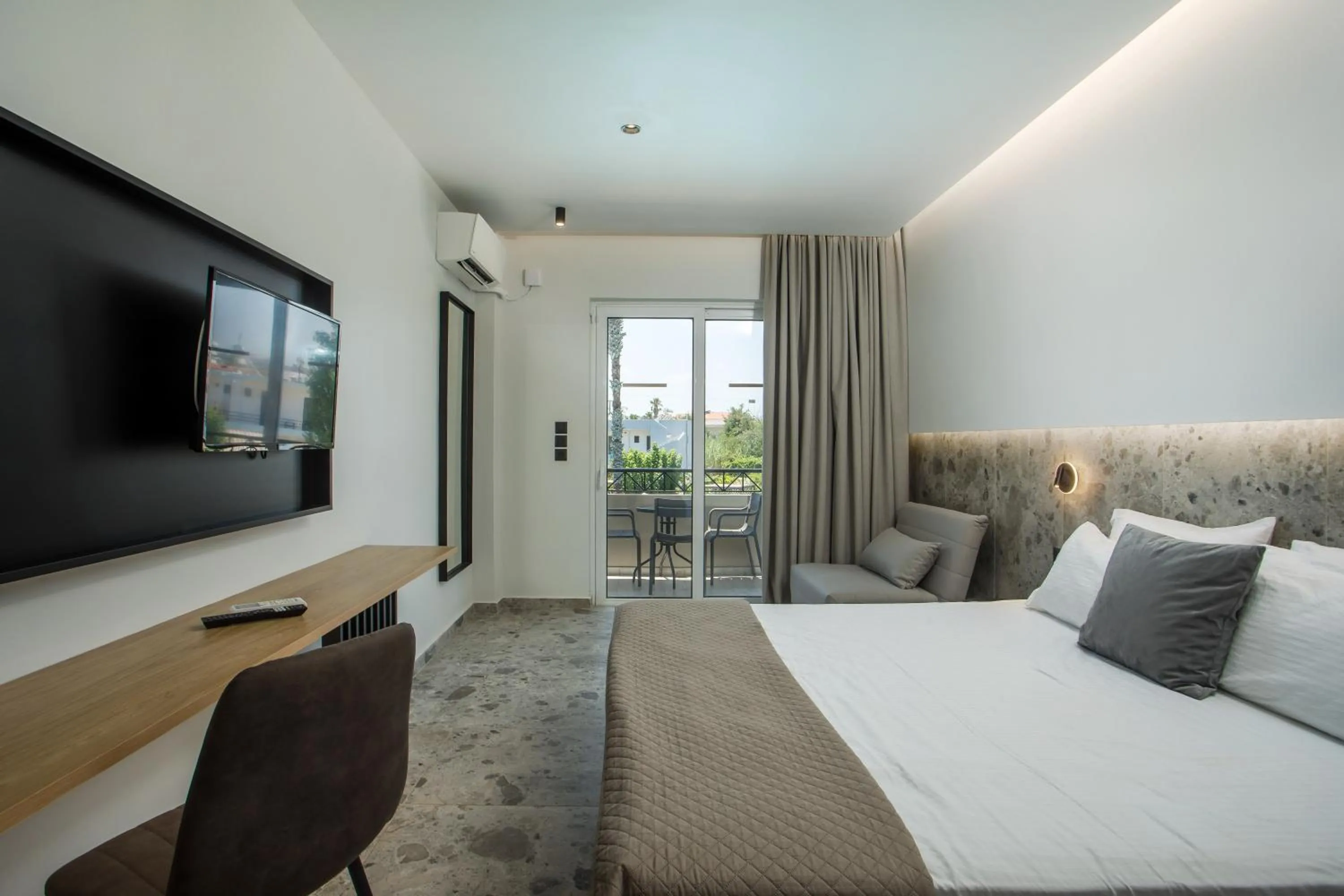 Bed in Dias Studios & Suites